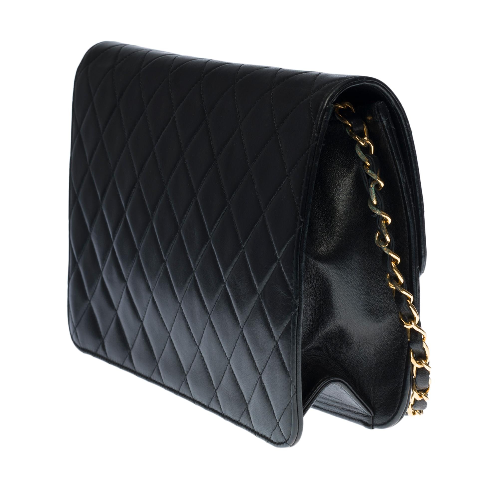 Chanel Classic Flap bag shoulder bag in black quilted lambskin and gold hardware In Good Condition In Paris, IDF