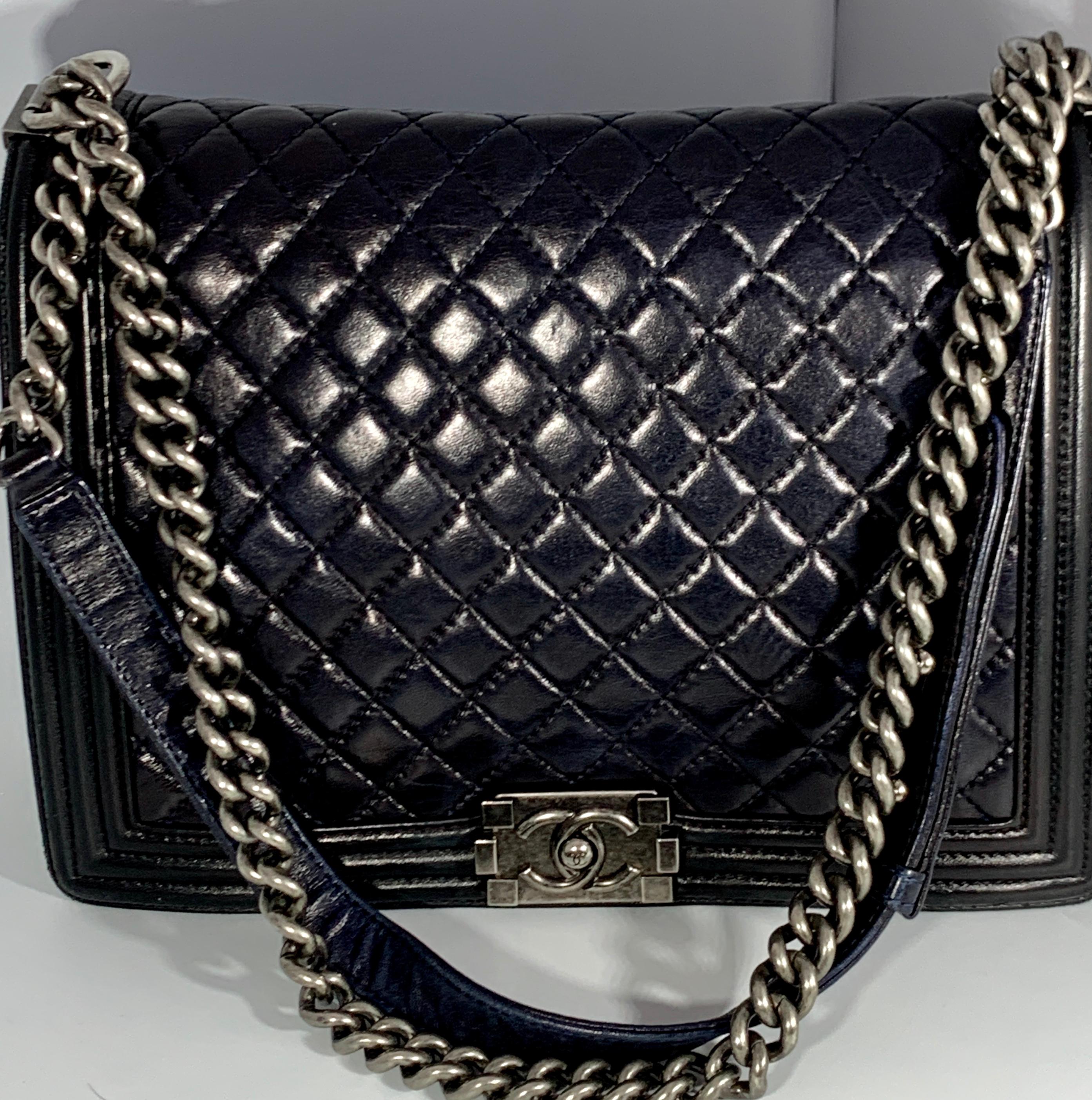 Chanel blue calfskin leather LE boy bag
 Classic quilted pattern 
aged silver hardware and clasp. 
Largest size in this style. 
Strap can be doubled or worn single cross body. Purchased directly from Chanel. Comes with dust cover
 size 12