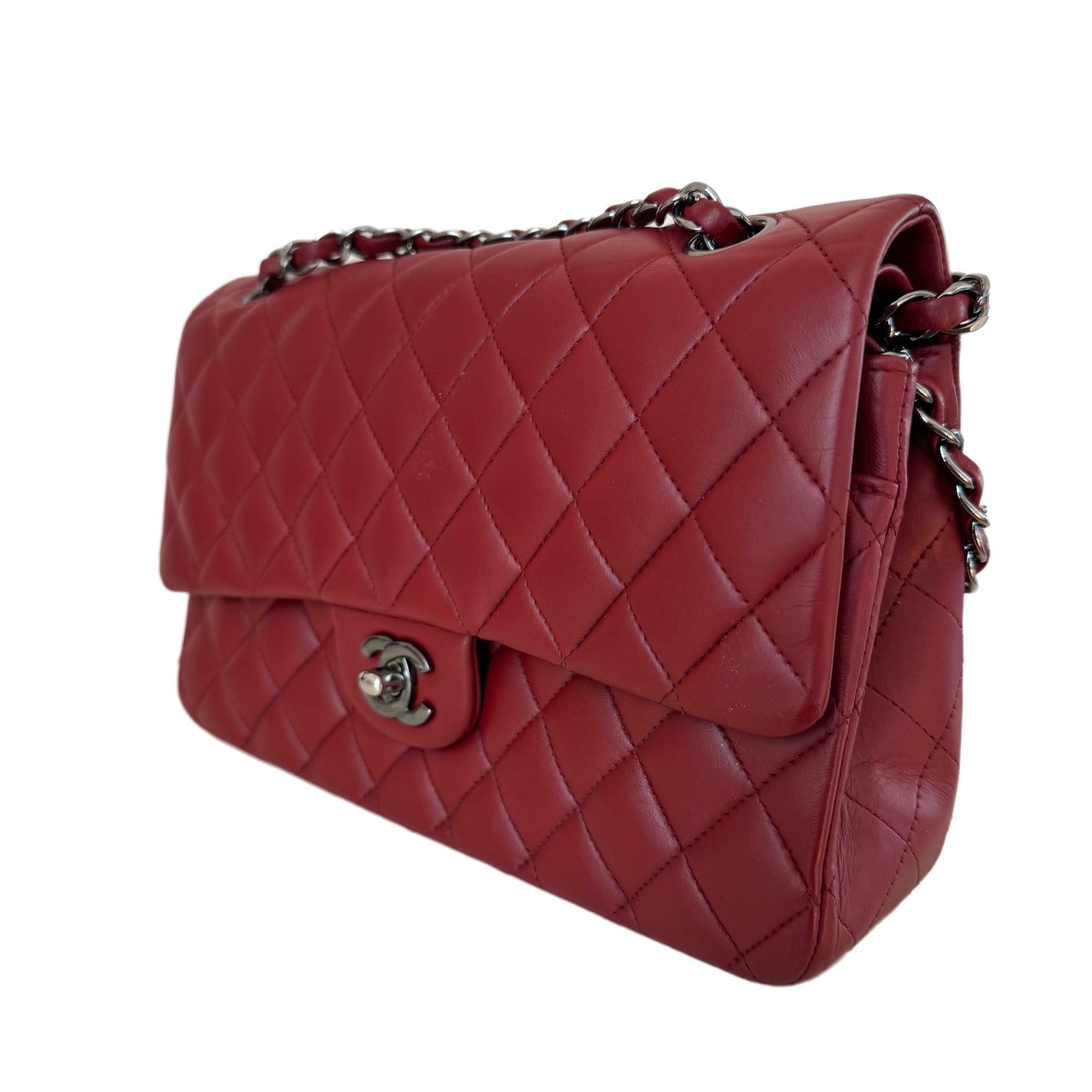 Chanel Classic Flap Burgundy Lambskin Leather Gunmetal Grey HW, 2011-2012
 These are professional photos of the actual bag.
 Stunning burgundy hue paired with a sleek gunmetal grey hardware, crafted from premium lambskin leather.
 CONDITION: GOOD
