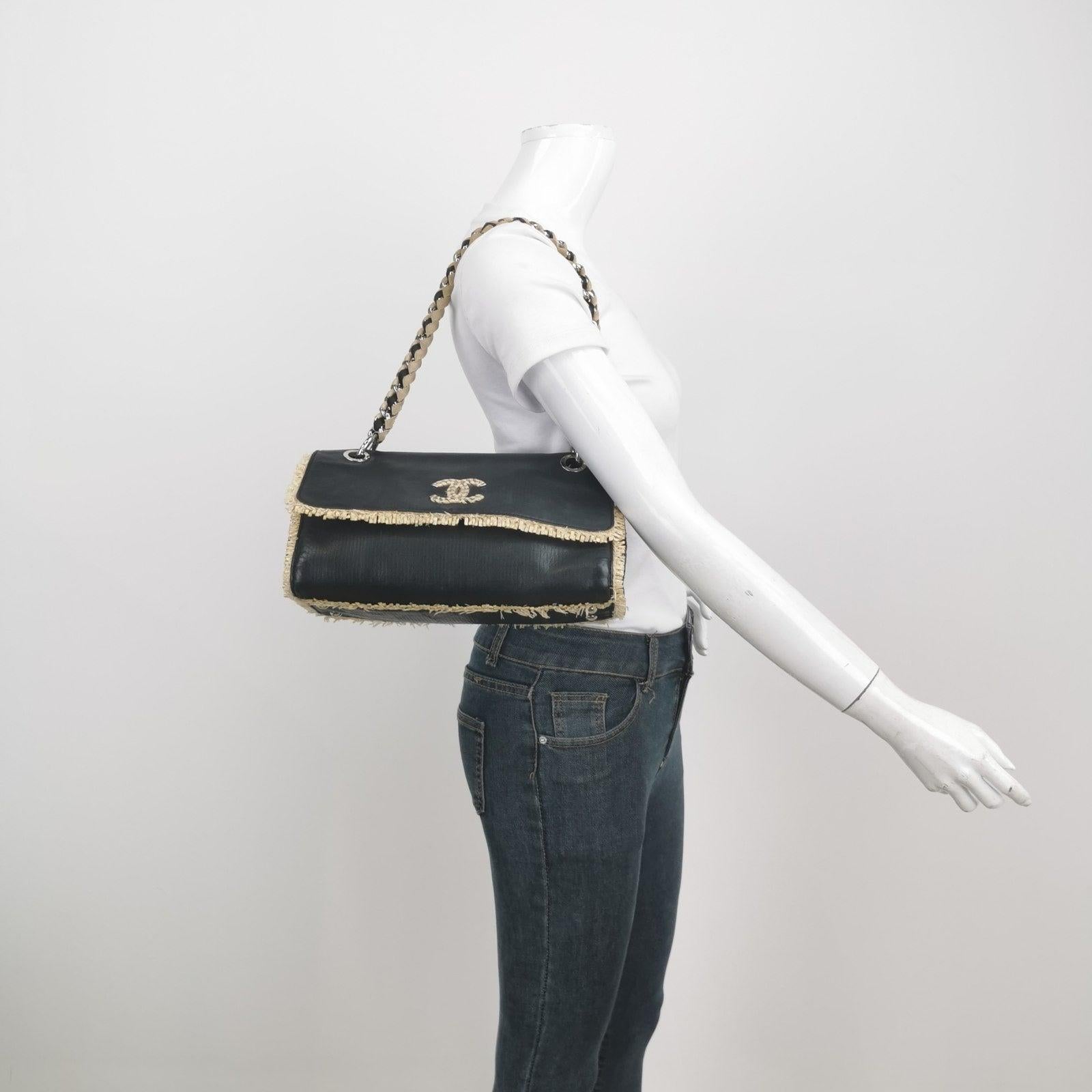 Chanel Classic Flap Chain Shoulder Bag Large Black Leather and Straw These are professional photos of the actual bag. 
 
 Enhance your style this season with the limited edition Chanel Classic Flap shoulder bag. Expertly crafted from high-quality