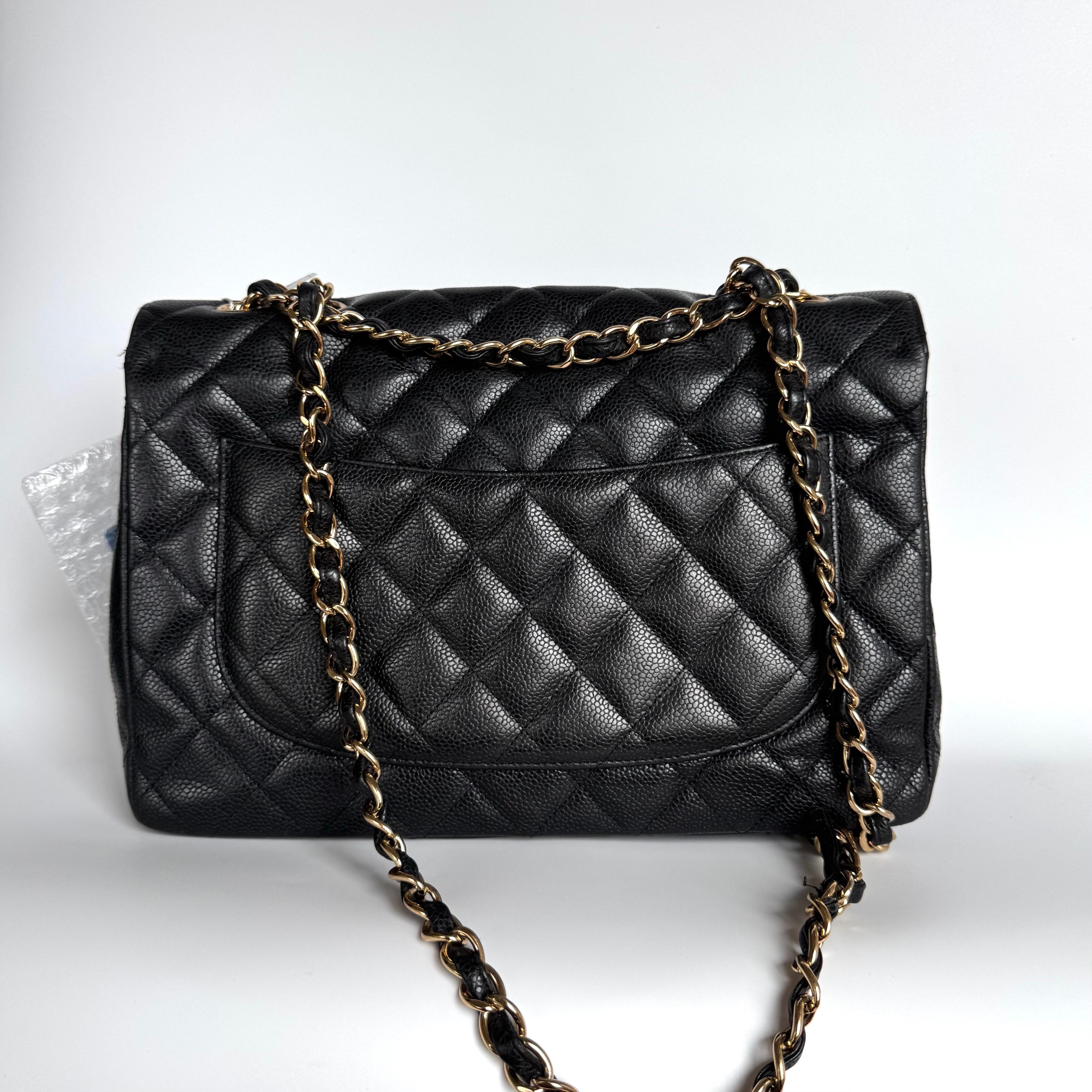 Chanel Classic Flap Jumbo Black Caviar Leather Single Flap Gold Hardware 2009 In Good Condition For Sale In AUBERVILLIERS, FR