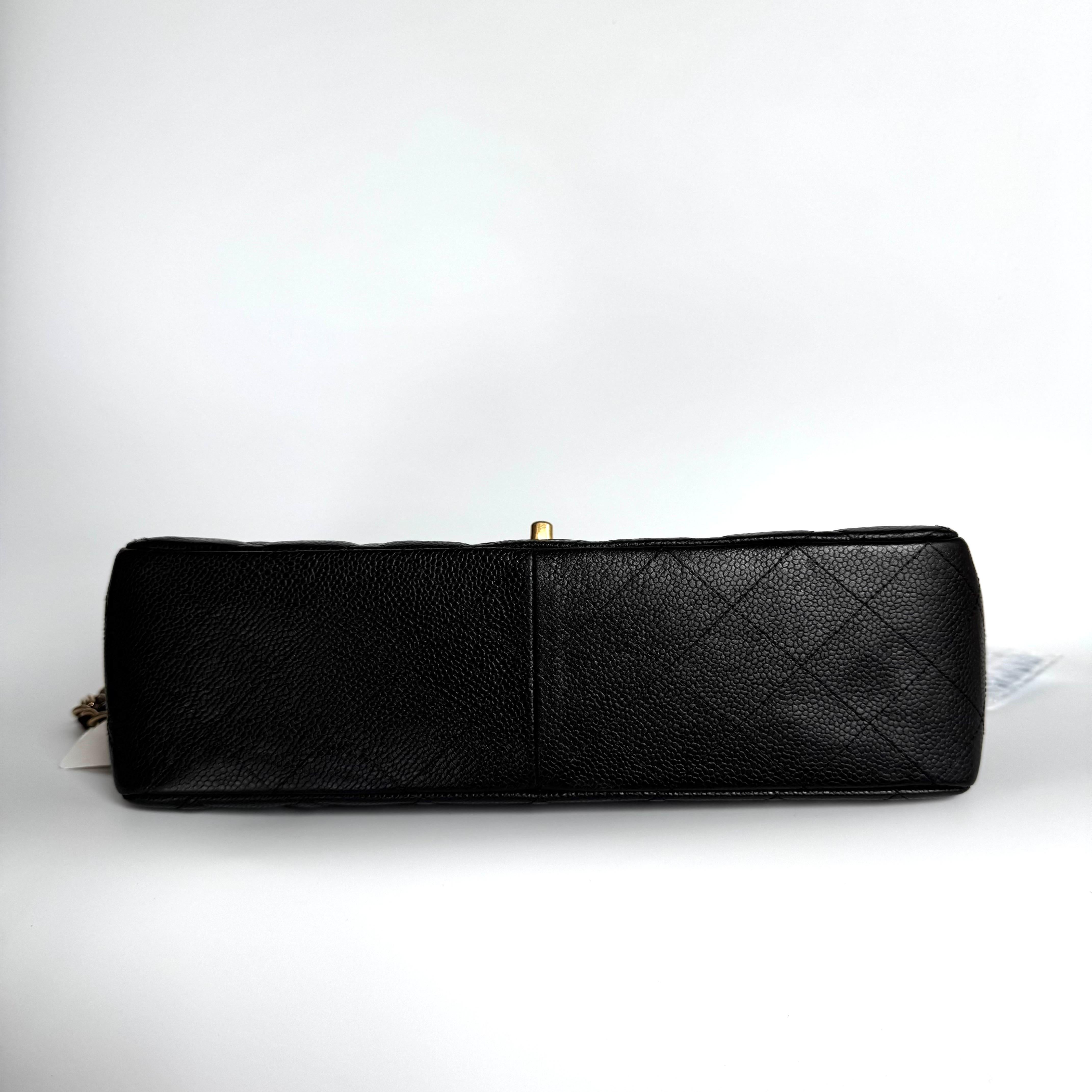 Women's Chanel Classic Flap Jumbo Black Caviar Leather Single Flap Gold Hardware 2009 For Sale