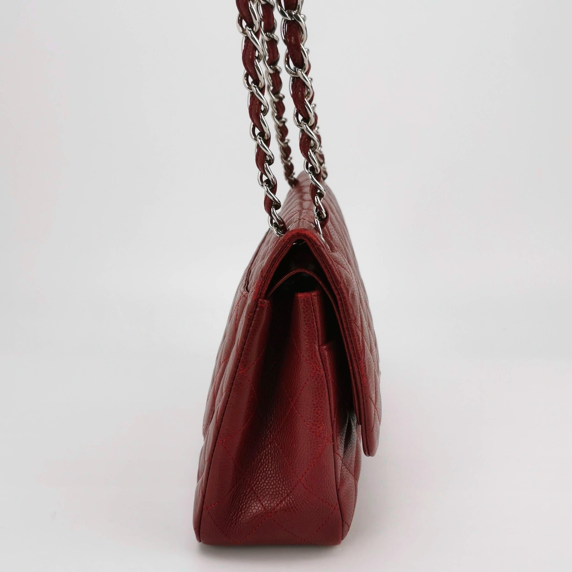 Chanel Classic Flap Jumbo Dark Red Caviar Leather Double Flap Silver Hardware
These are professional photos of the actual bag offered by Luxbags.
CONDITION: EXCELLENT
Light creases on the bottom and light scratches on the back of the bag and the
