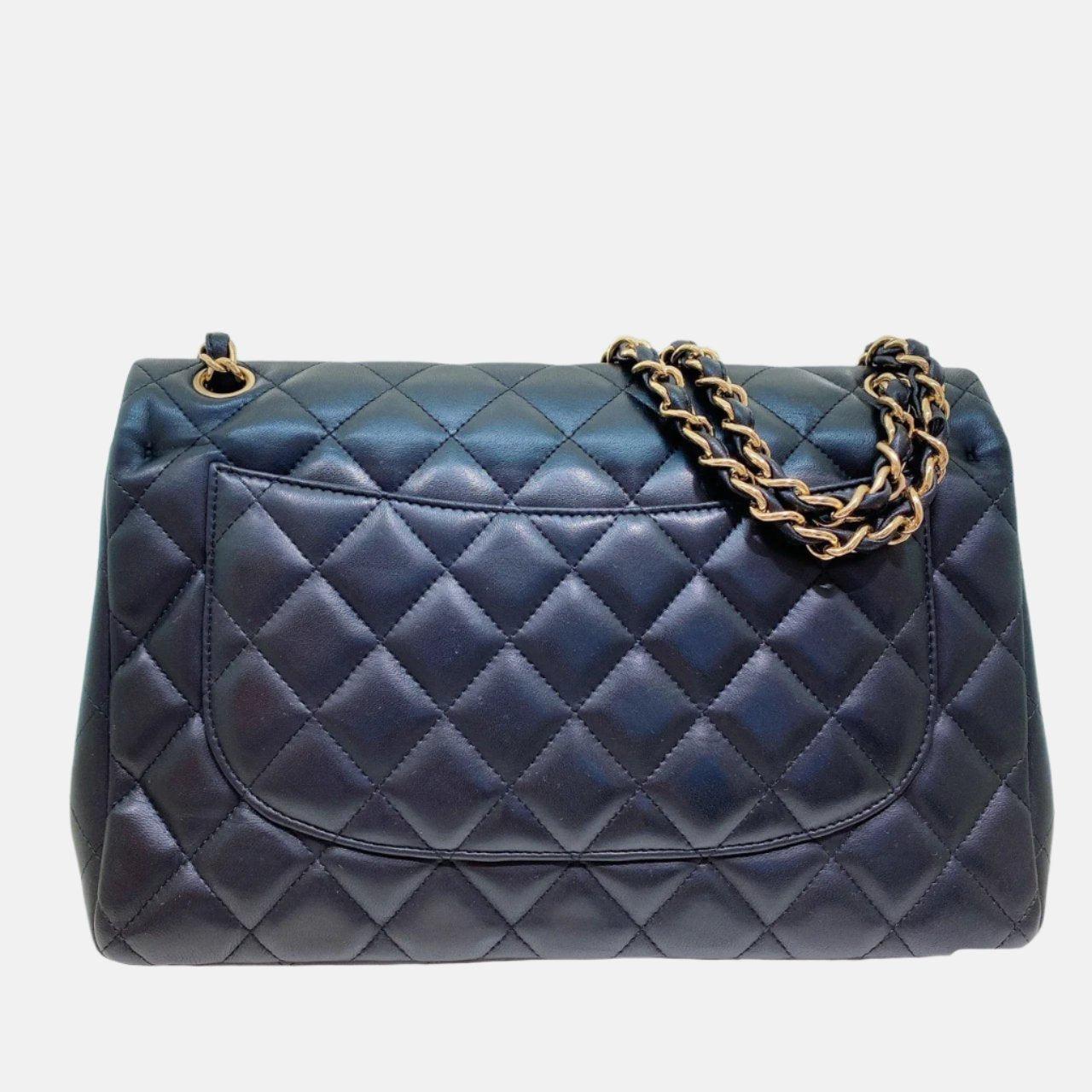 Chanel Classic Flap Jumbo Black Lambskin Leather Double Flap Gold Hardware, 2011-2012
 These are professional photos of the actual bag offered by Luxbags.
 Embrace luxury with this timeless Chanel Classic Jumbo/Large Flap bag crafted in a luxurious
