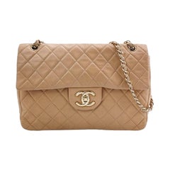 Chanel Classic Flap Maxi Beige Latte Lambskin Leather Giant Gold-tone CC Logo