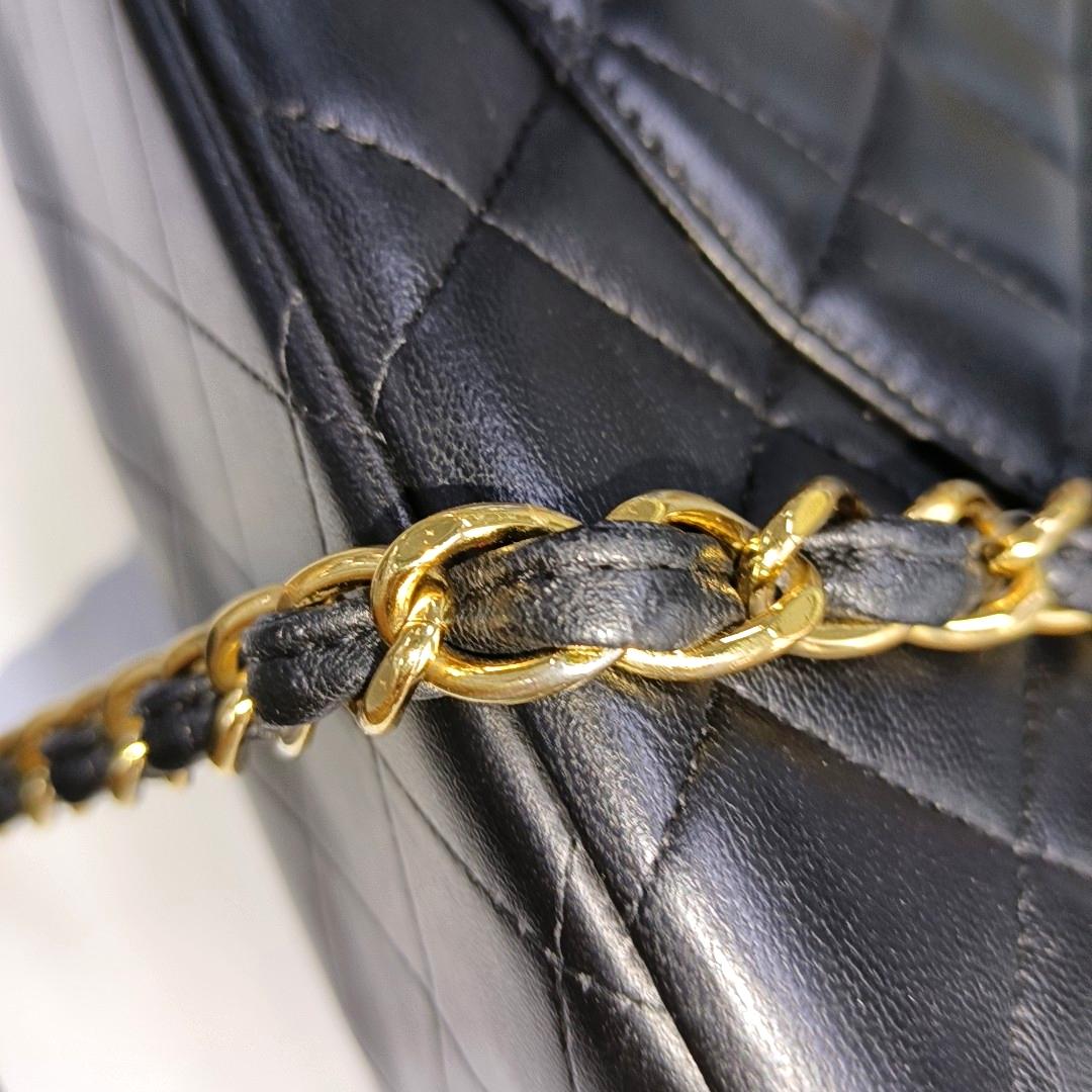 Chanel Classic Flap Maxi Black Lambskin Leather Double Flap with Gold Hardware For Sale 12