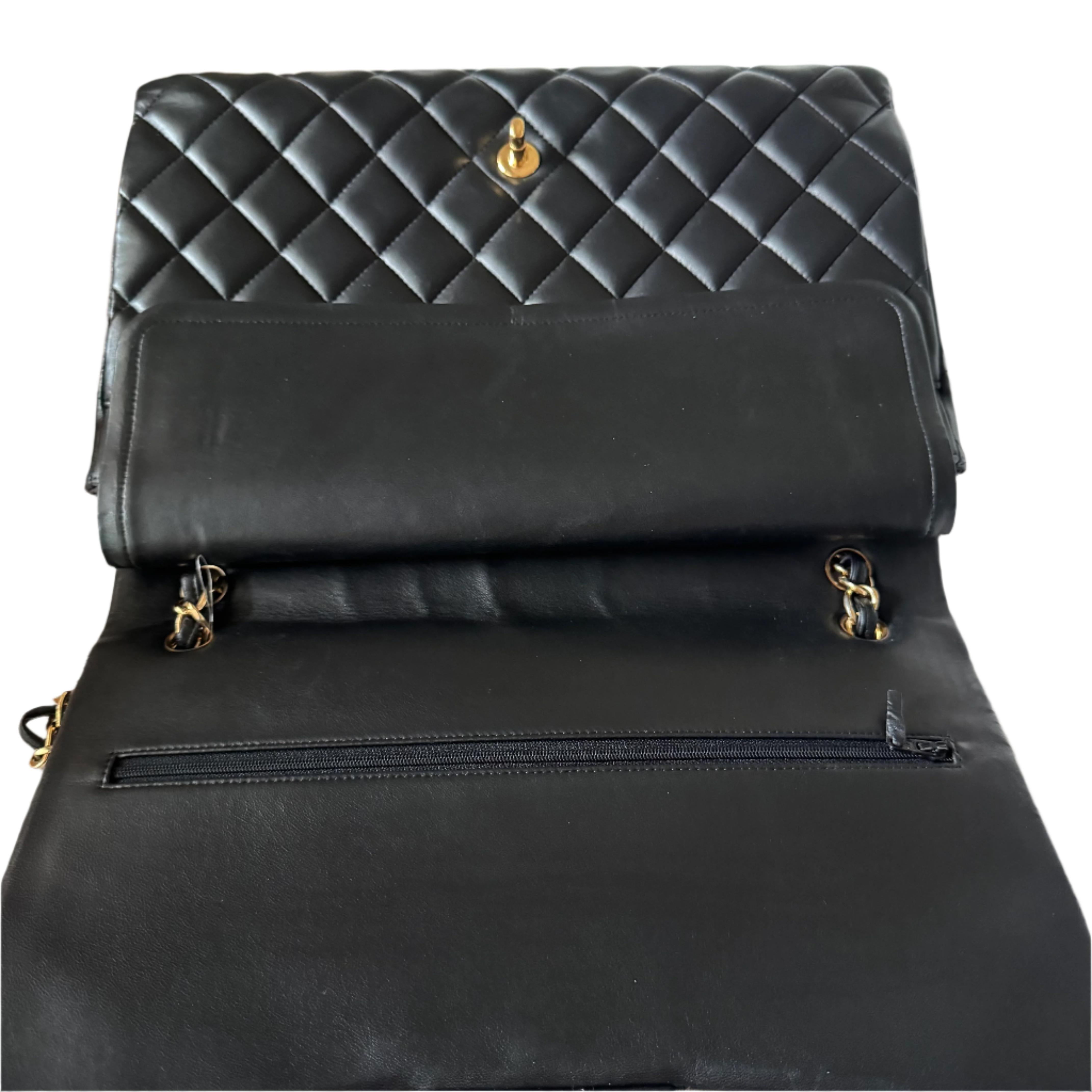 Women's Chanel Classic Flap Maxi Black Lambskin Leather Double Flap with Gold-tone Hardw For Sale