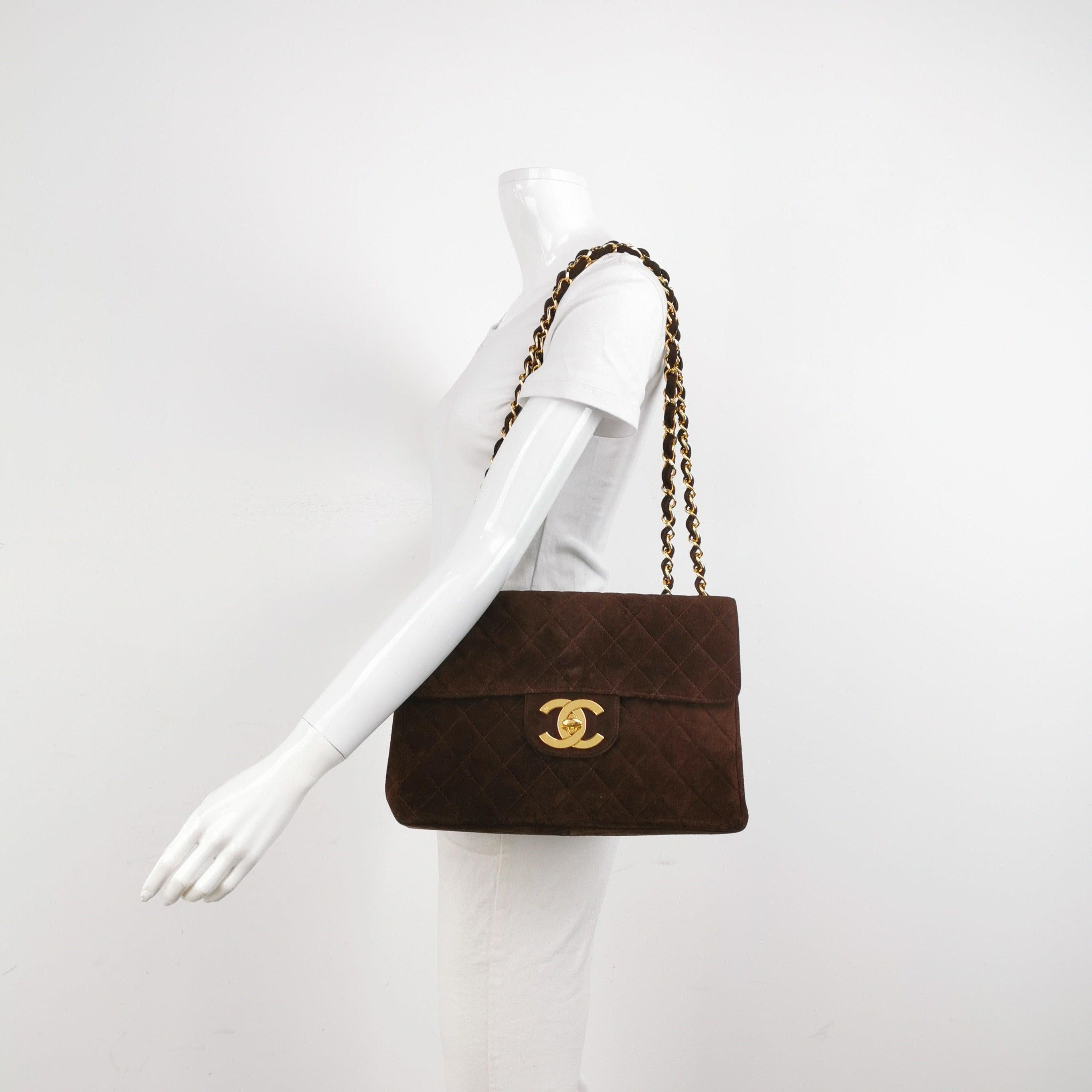 Chanel Classic Flap Maxi Chocolate Browm Suede Leather Giant Gold CC Logo
 These are professional photos of the actual bag.
 CONDITION: Very good vintage condition with light signs of use throughout. Some creases on the leather, scratches on the
