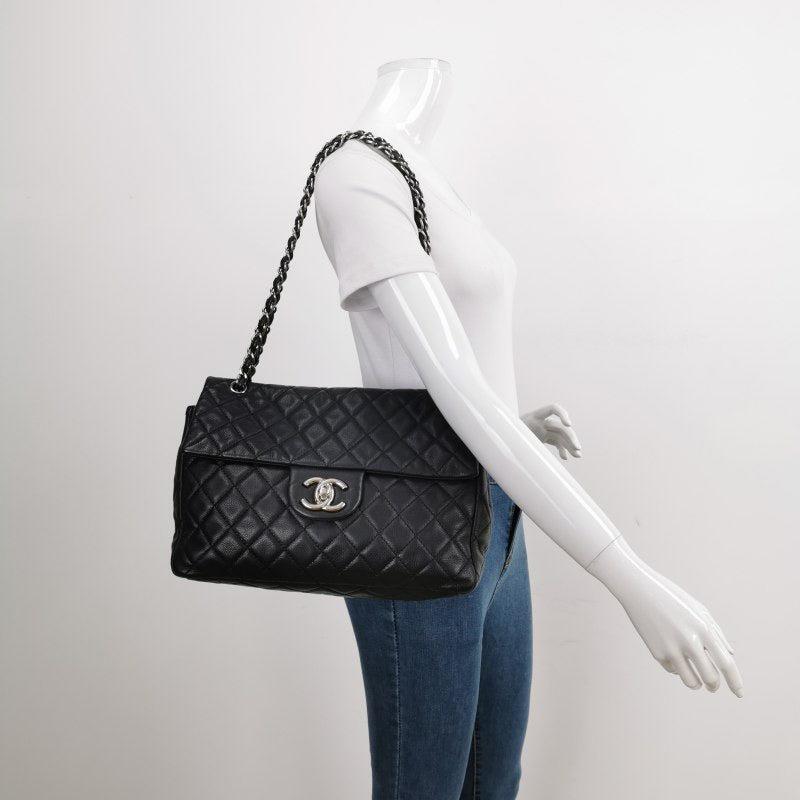Chanel Classic Flap Maxi Black Soft Caviar Leather Silver-tone Hardware Giant CC Logo
These are professional photos of the actual bag.
  Experience timeless elegance with the Chanel Classic Flap Maxi Shoulder Bag. Crafted with soft luxurious caviar