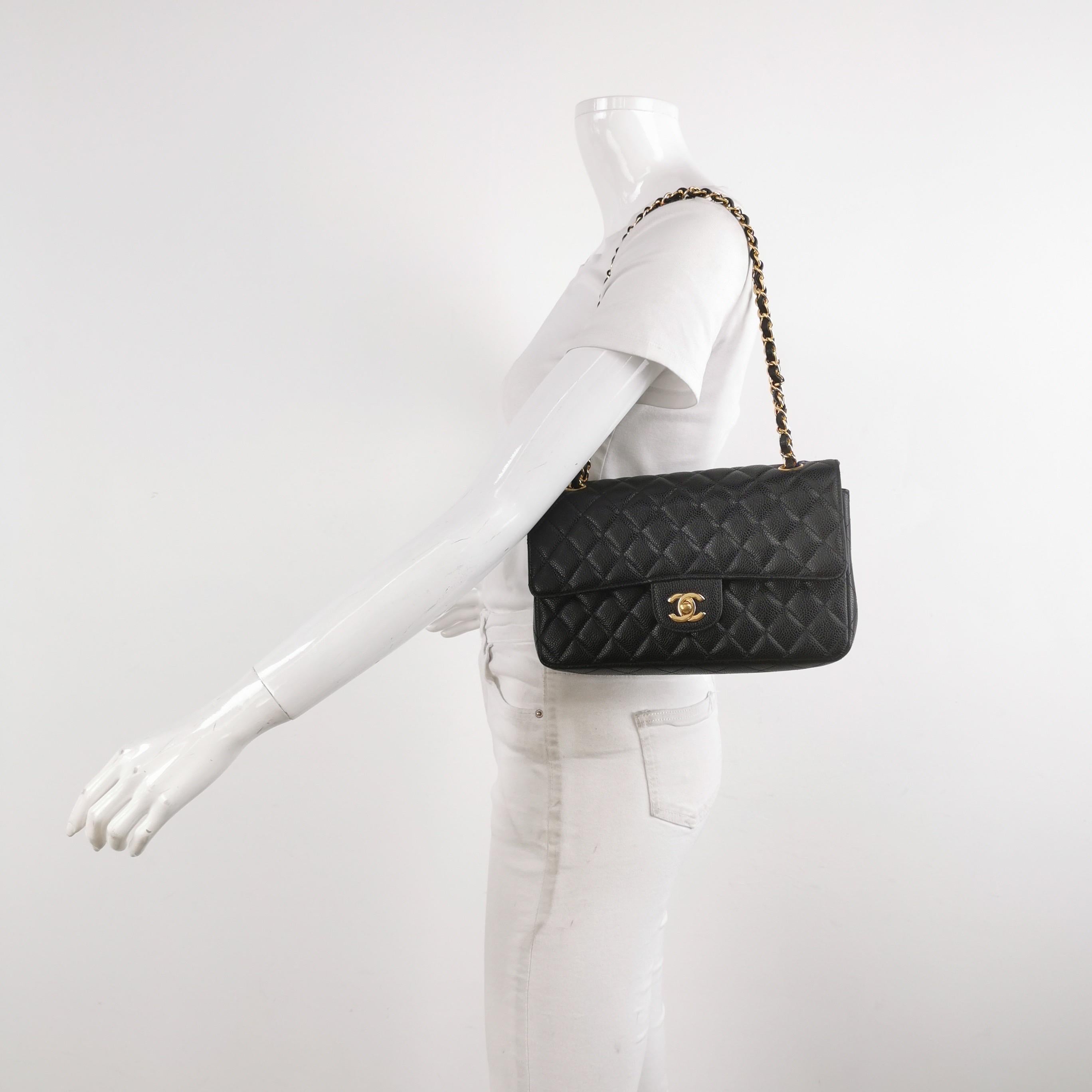 CONDITION: VERY GOOD

This authentic Chanel bag is in very good condition. Light scratches around hardware, scratches inside. Leather creases around the bottom and on the back of the flap. Crack on the button below the flap. 

DETAILS

Circa