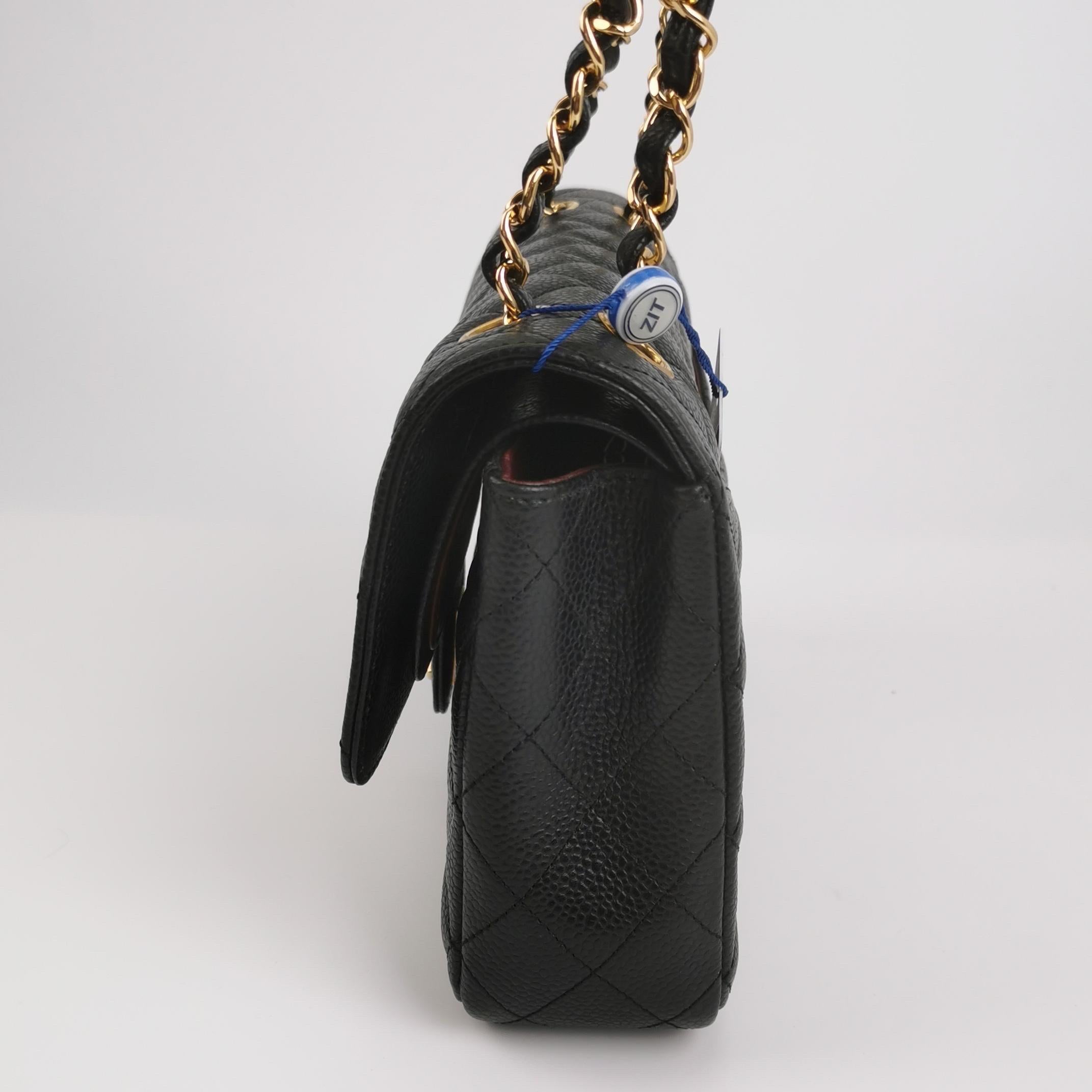 Women's Chanel Classic Flap Medium Black Caviar Leather Gold-tone Hardware 2012-2013 For Sale
