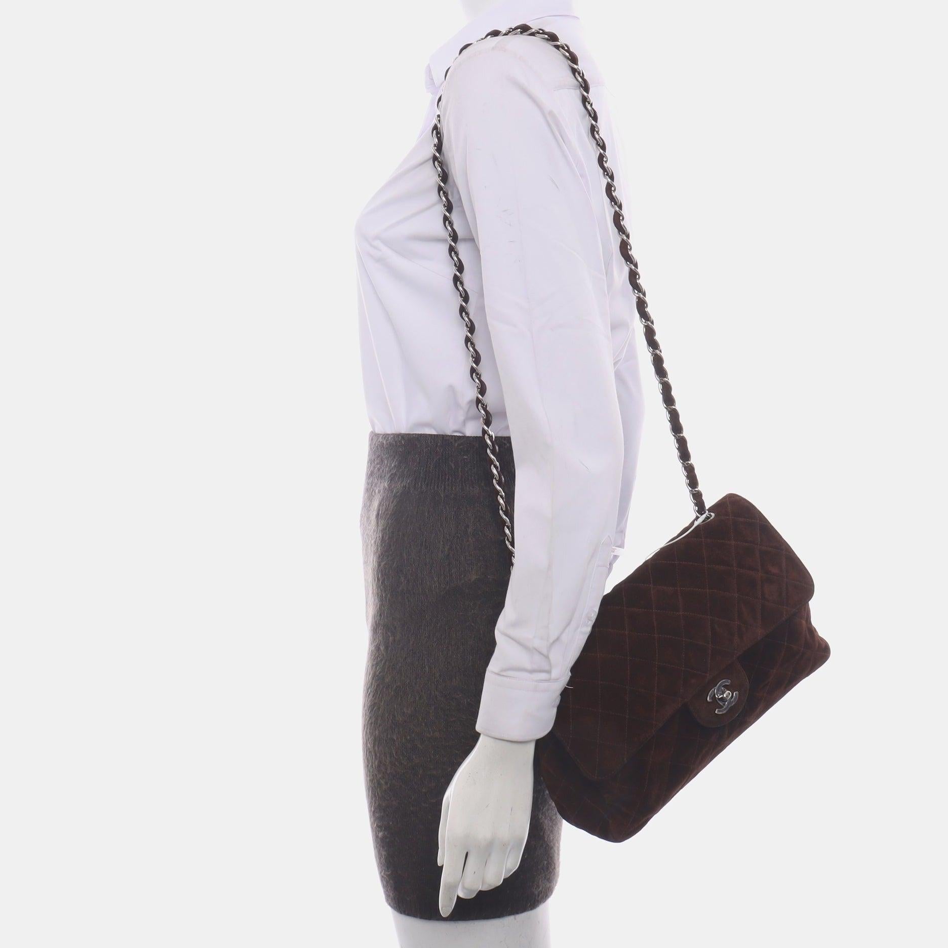 Chanel Classic Flap Medium Dark Chocolate Brown Suede Leather Silver HW, 1996-1997
  These are professional photos of the actual bag.
  CONDITION: GOOD
  This previously owned and used item is in good condition with moderate signs of use. The bag