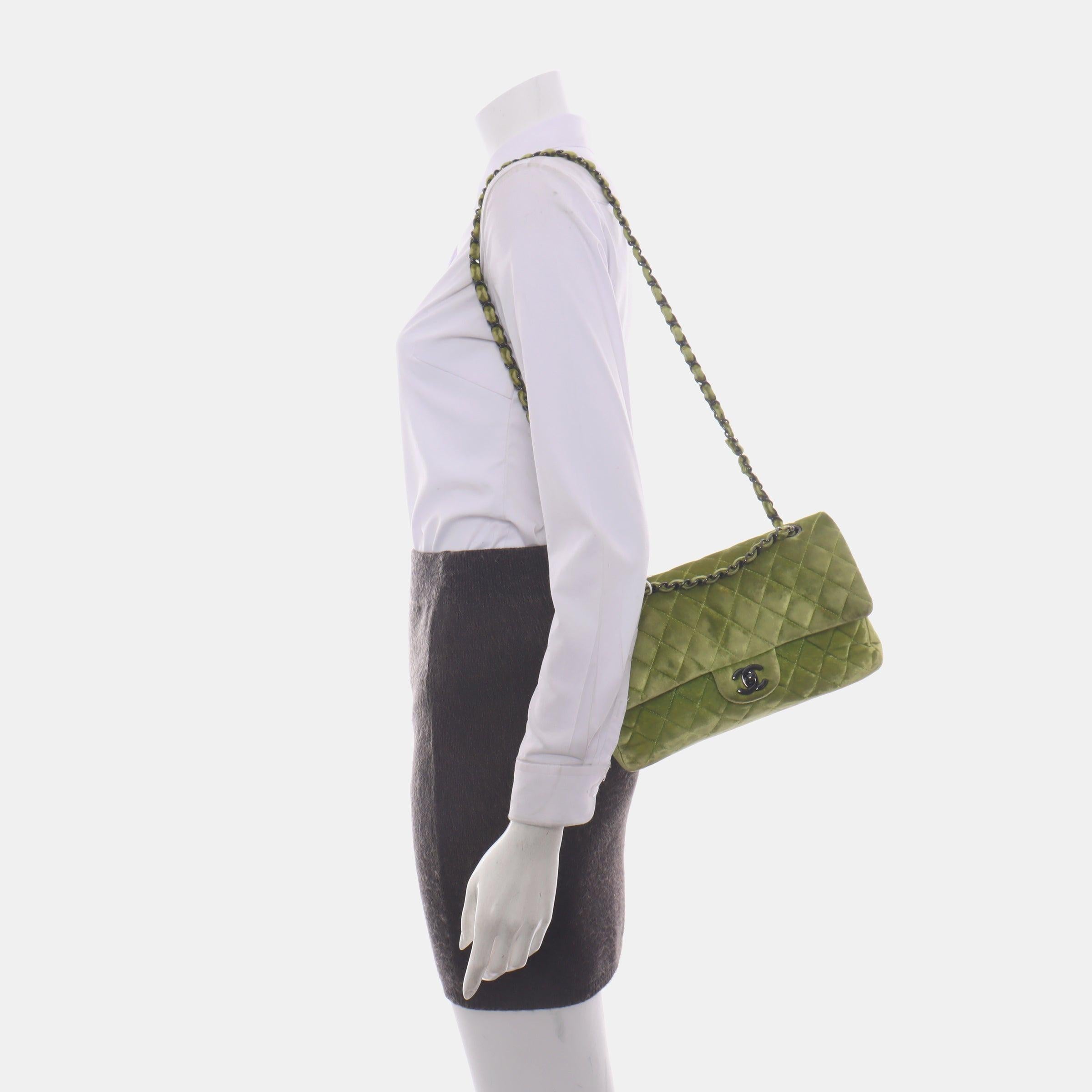 Chanel Classic Flap Medium Green Velvet Black Hardware, 2014-2015
 These are professional photos of the actual bag offered by Luxbags.
 Add a touch of brightness to your summer wardrobe with this classic flap from Chanel, featuring a cheerful shine