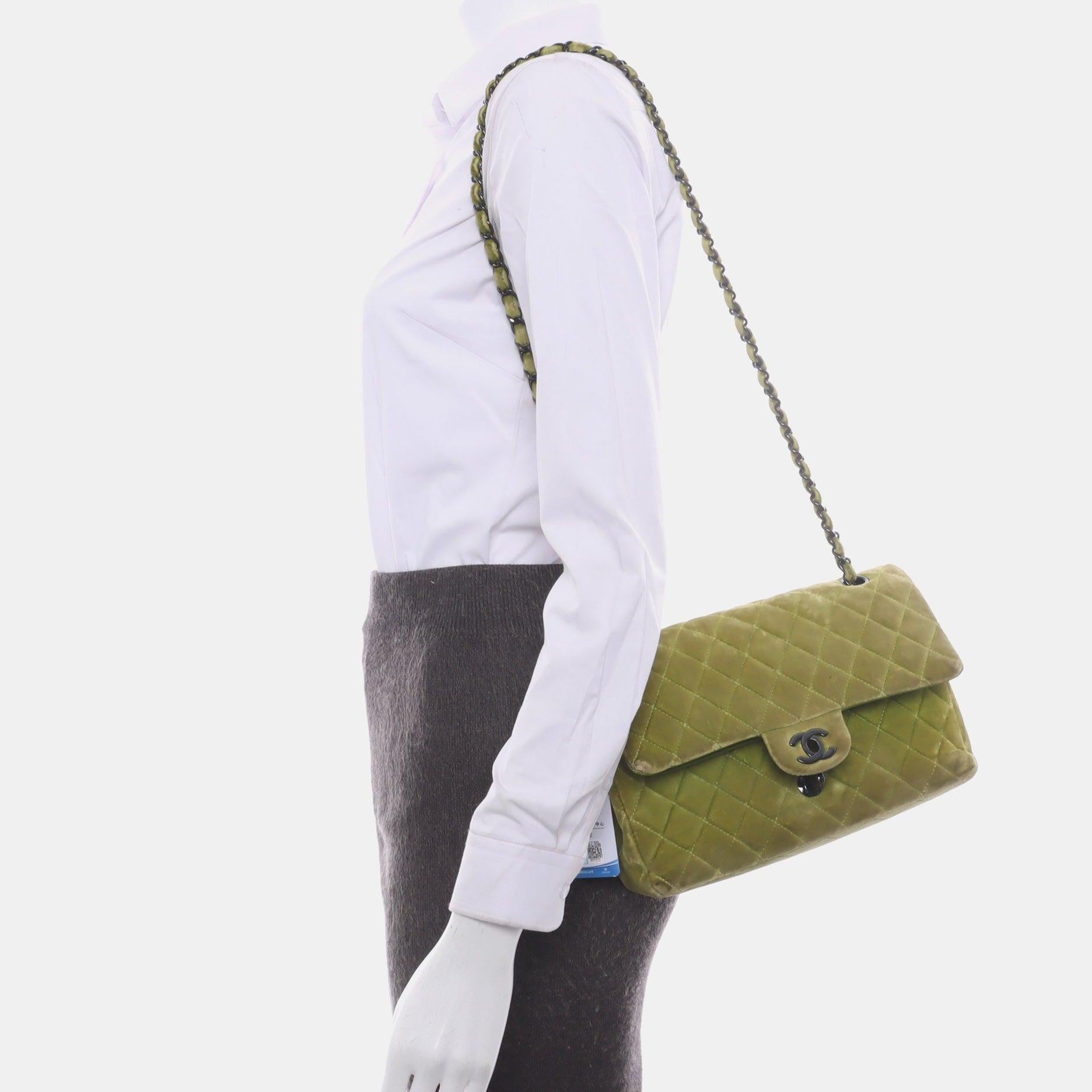 Chanel Classic Flap Medium Green Velvet Black Hardware, 2014-2015
  These are professional photos of the actual bag offered by Luxbags.
  Add a touch of brightness to your summer wardrobe with this classic flap from Chanel, featuring a cheerful