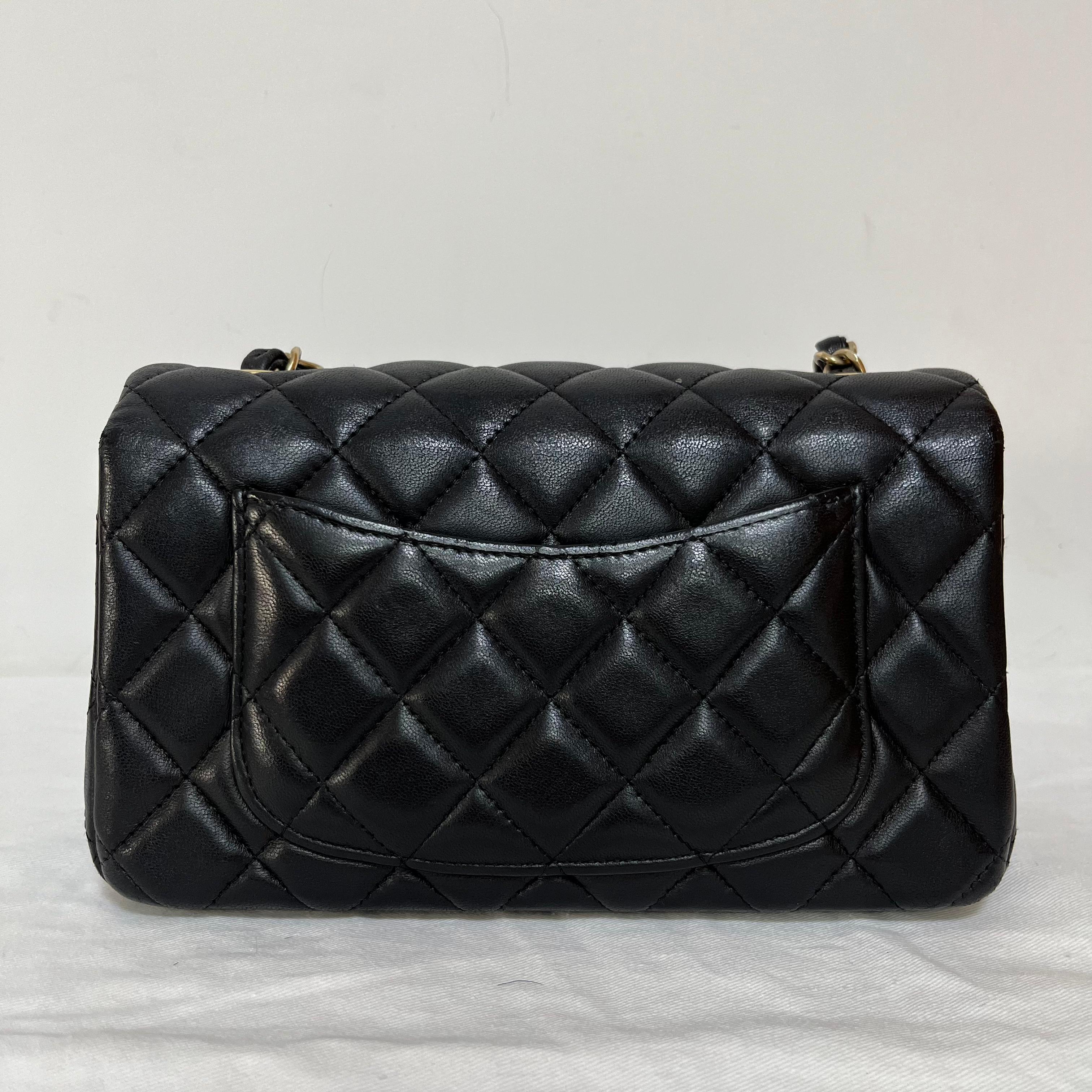 Chanel Classic Flap Rectangular Mini 2014 Black Lambskin Leather Gold Hardware
These are professional photos of the actual bag offered by Luxbags.
CONDITION: VERY GOOD CONDITION
This previously owned/ used authentic Chanel CF mini is in very good