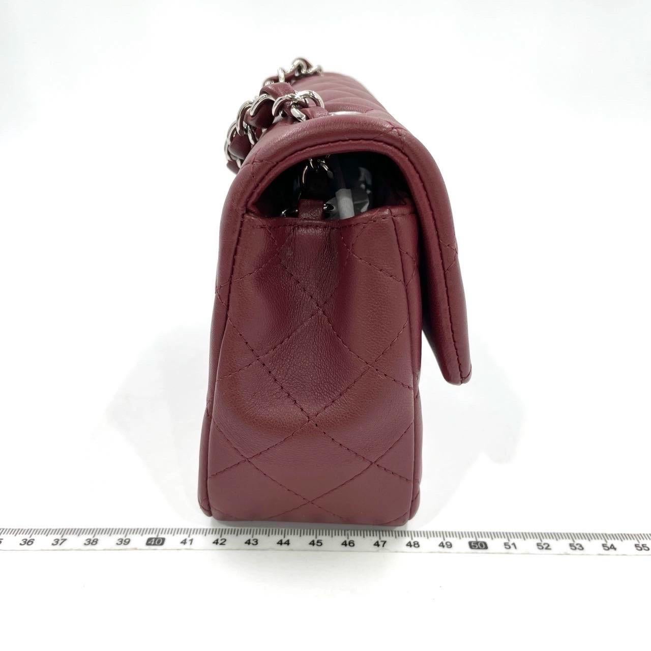 CONDITION: MINT

Original Condition.

DETAILS:

circa 2019
Series 28xxxxxx
Classic Flap
Lambskin leather 
Burgundy
Silver tone hardware
Size: mini
Dimensions: Width 20cm x Height 13cm x Depth 7cm
(7.9 x 4.7 x 2.4 Inches) Chain length: 122