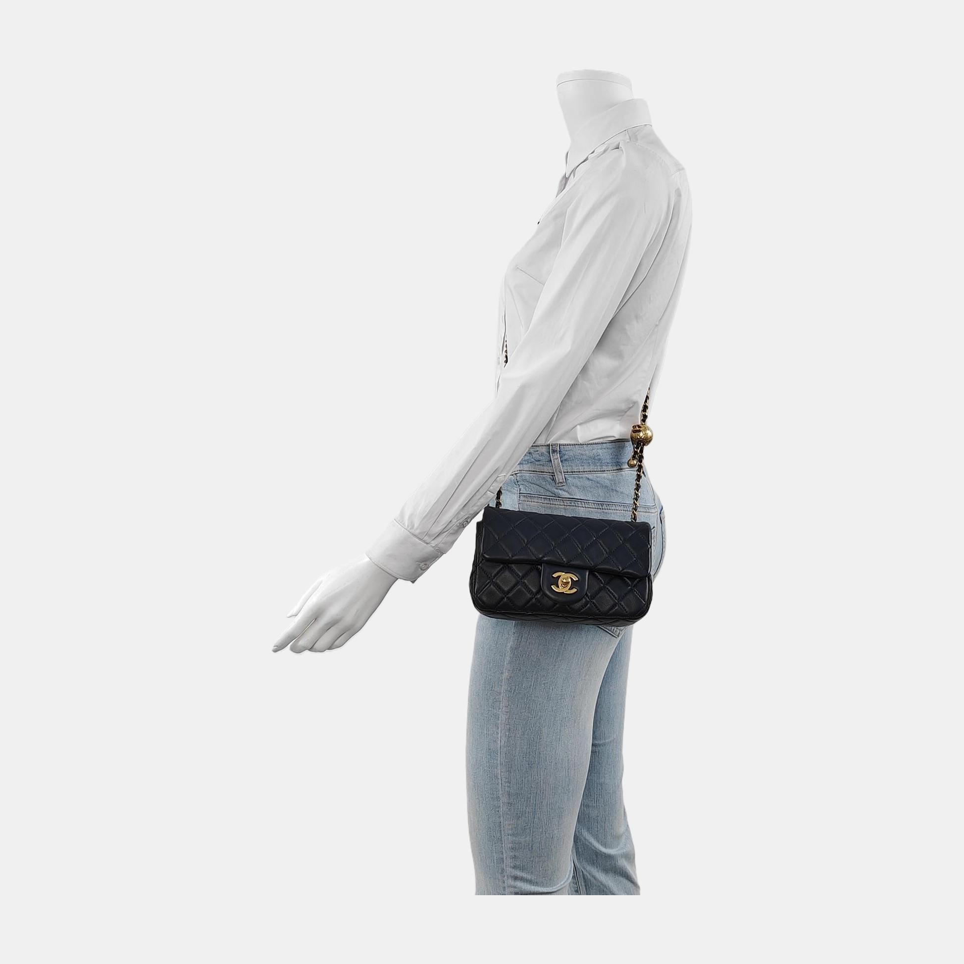 Add a touch of brightness to your summer wardrobe with this classic flap from Chanel, featuring a cheerful pastel with its misty blue leather.

CONDITION: MINT

This previously owned and used item is in mint condition with minimal signs of