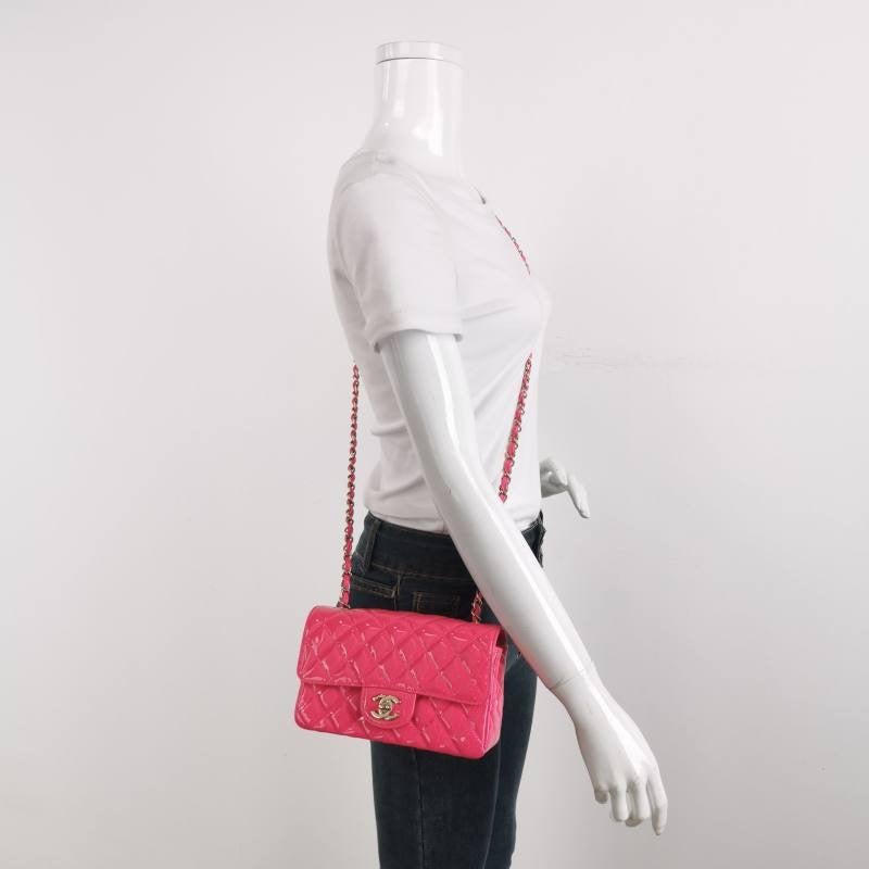 Chanel Classic Flap Rectangular Mini Pink Patent Leather Gold-tone Hardware, 2019
  These are professional photos of the actual bag offered by Luxbags.
  Add a touch of brightness to your summer wardrobe with this classic flap from Chanel, featuring