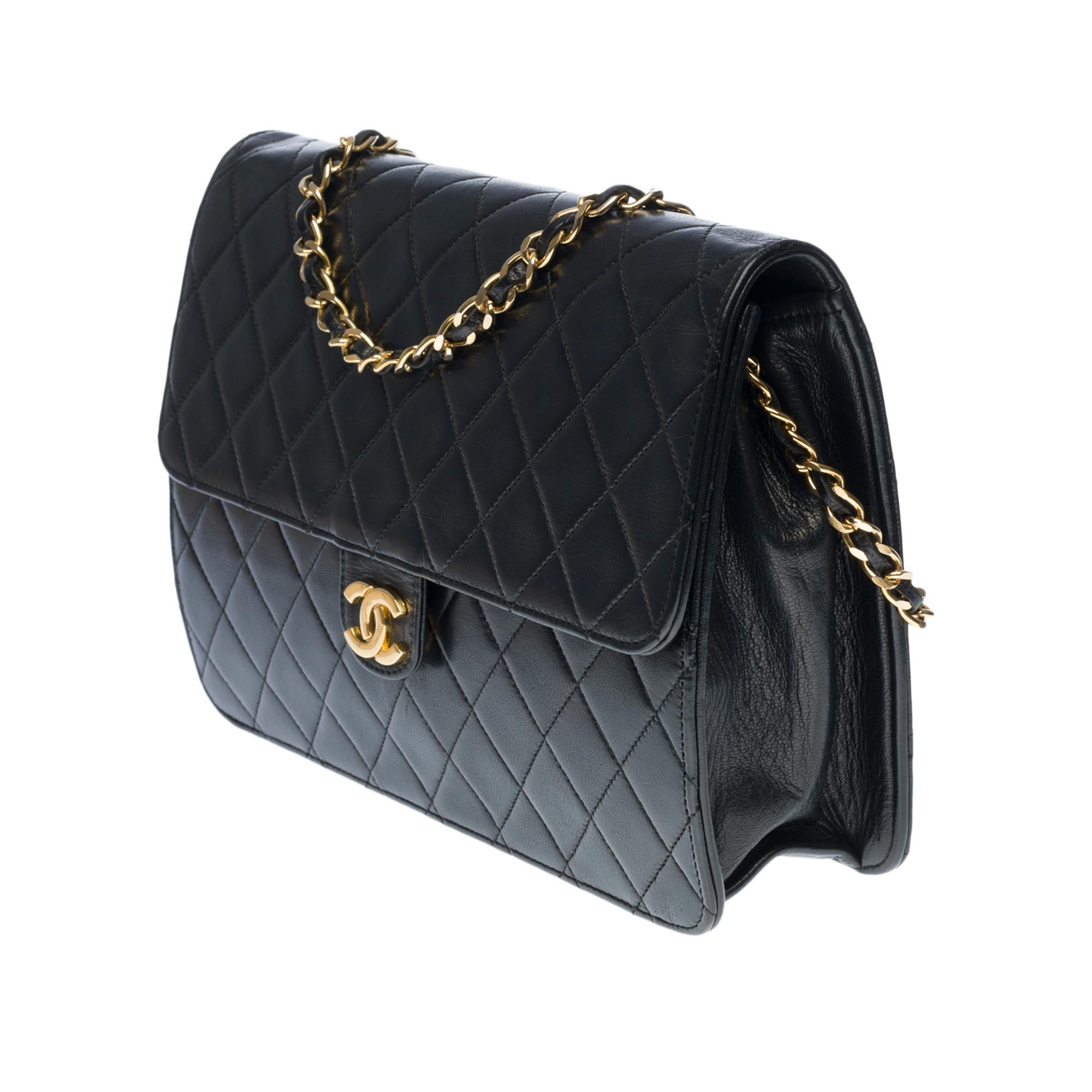 Black Chanel Classic Flap shoulder bag in black quilted lambskin and gold hardware
