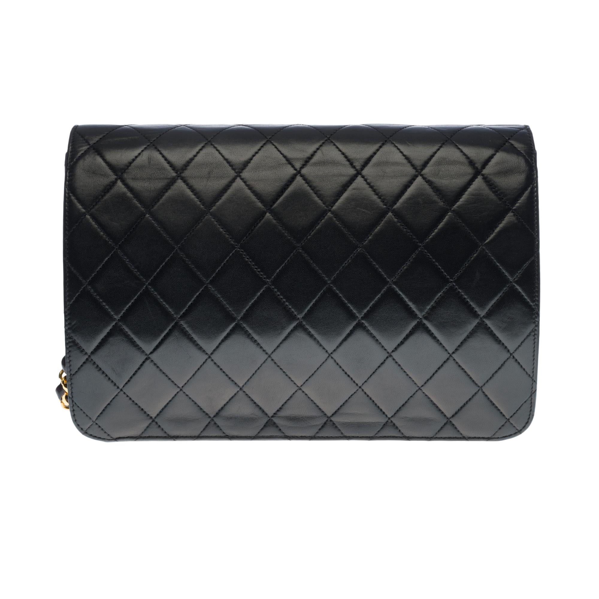 Black Chanel Classic shoulder Flap bag in black quilted lambskin and gold hardware