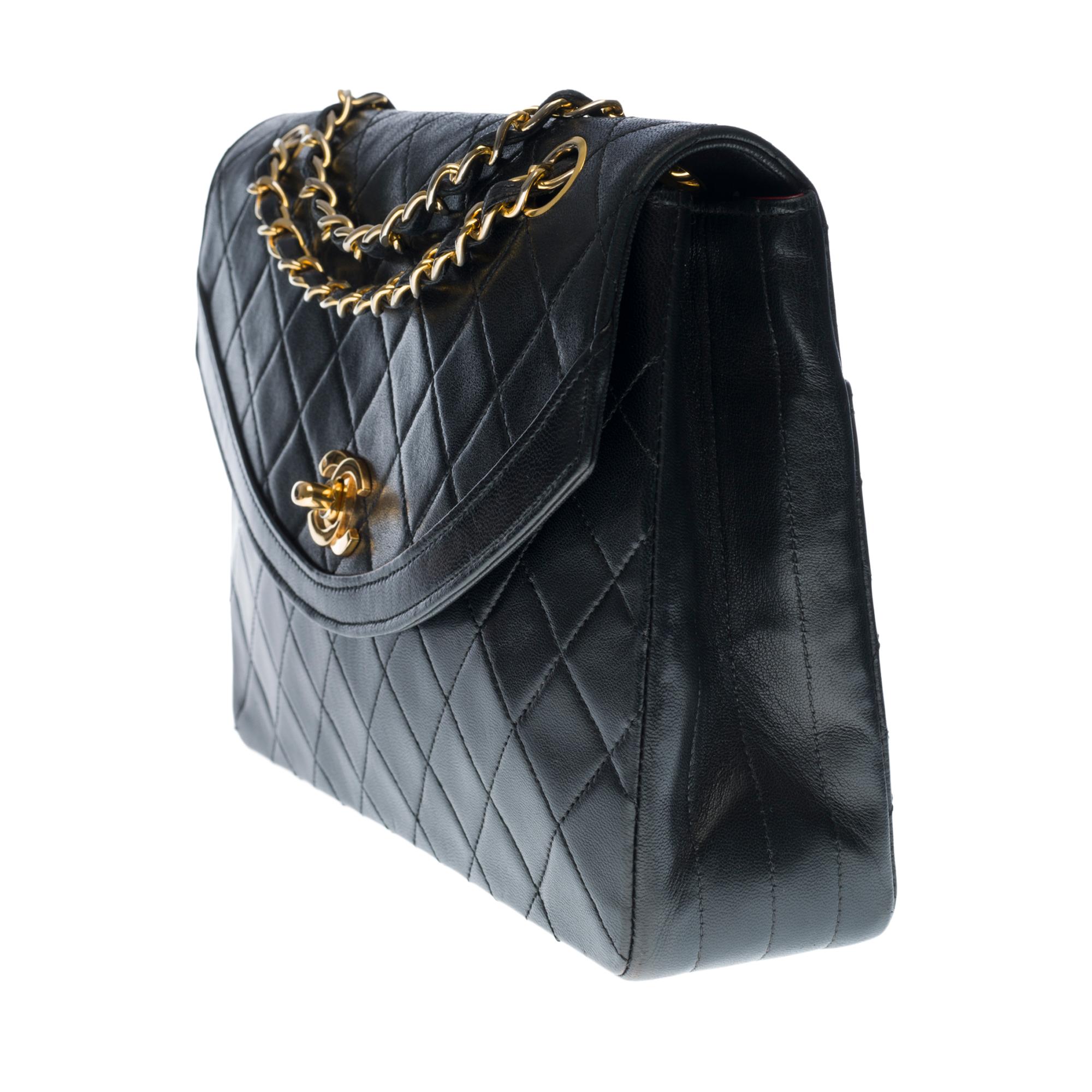 Black Chanel Classic Flap shoulder bag in black quilted lambskin and gold hardware