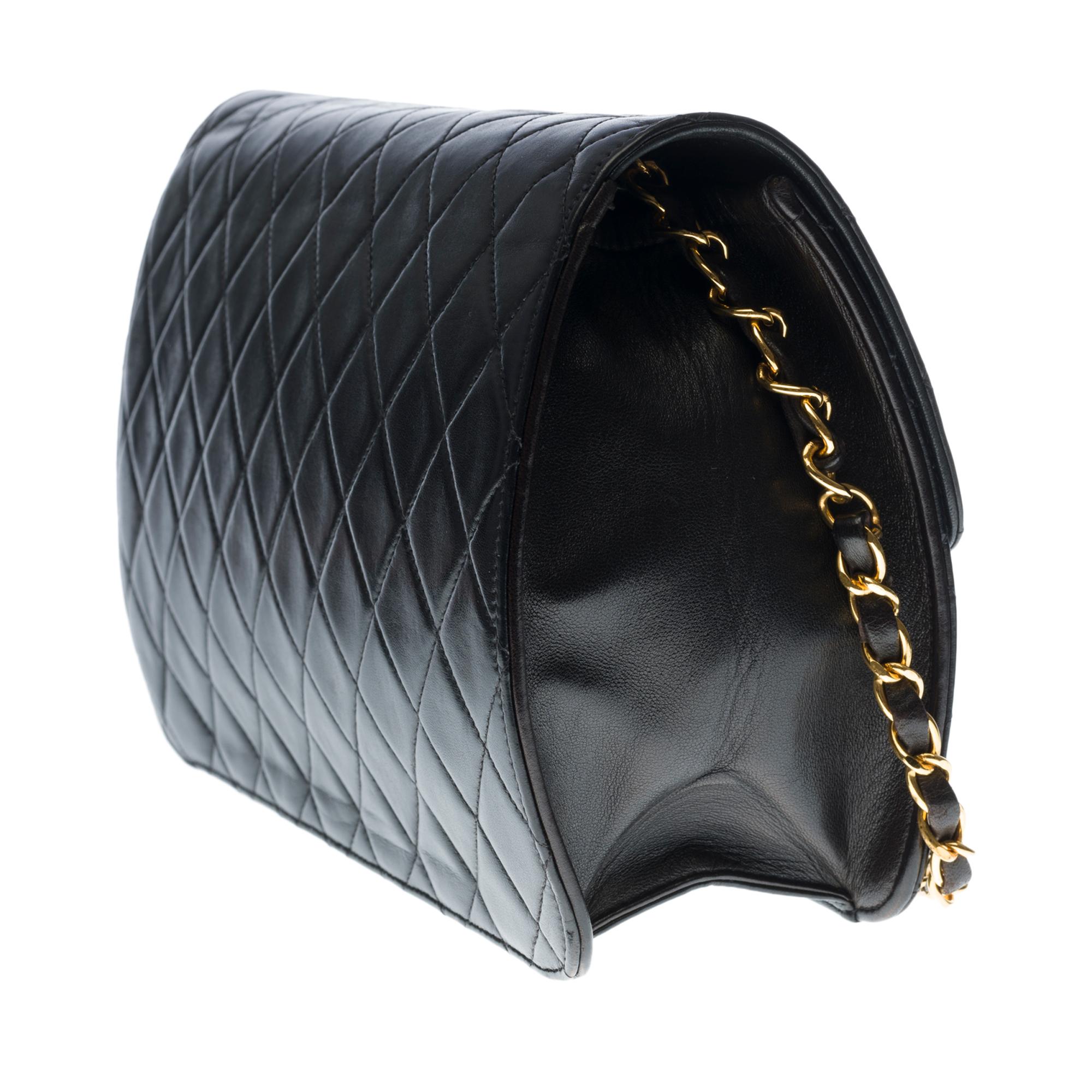 Women's Chanel Classic shoulder Flap bag in black quilted lambskin and gold hardware