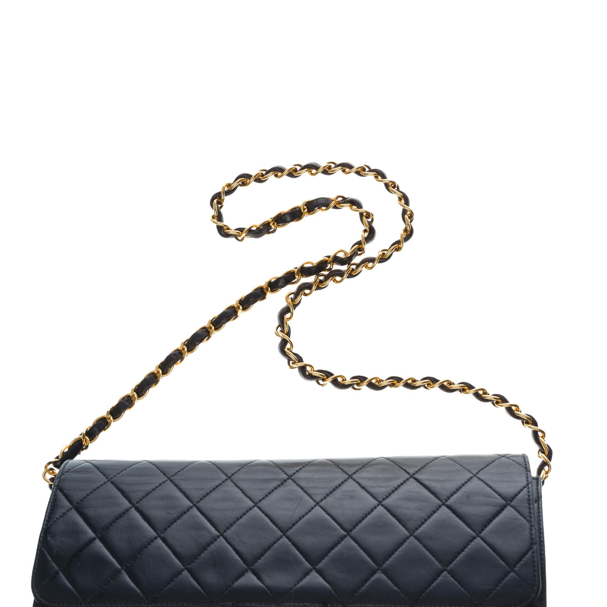 Chanel Classic shoulder Flap bag in black quilted lambskin and gold hardware 4