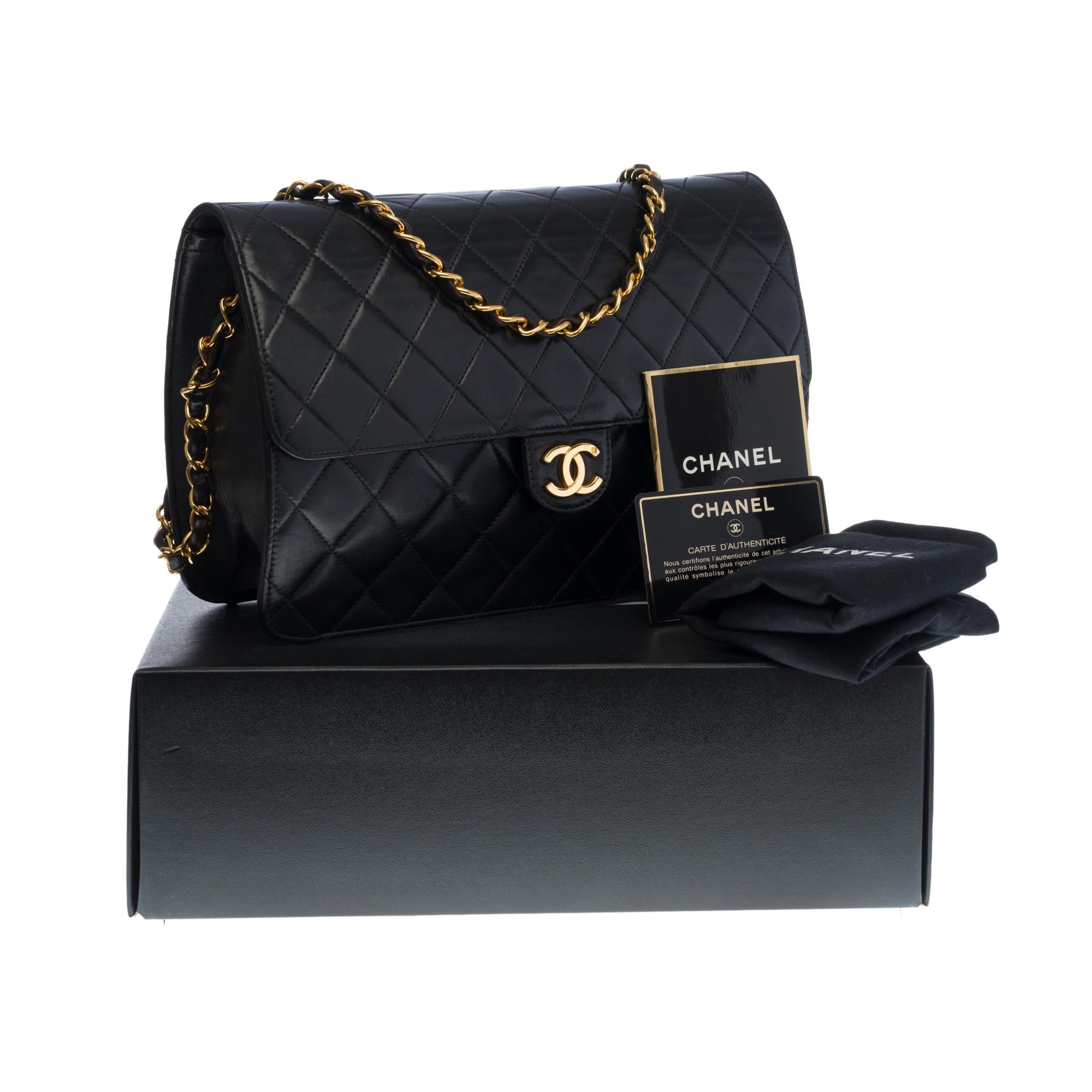 Chanel Classic shoulder Flap bag in black quilted lambskin and gold hardware