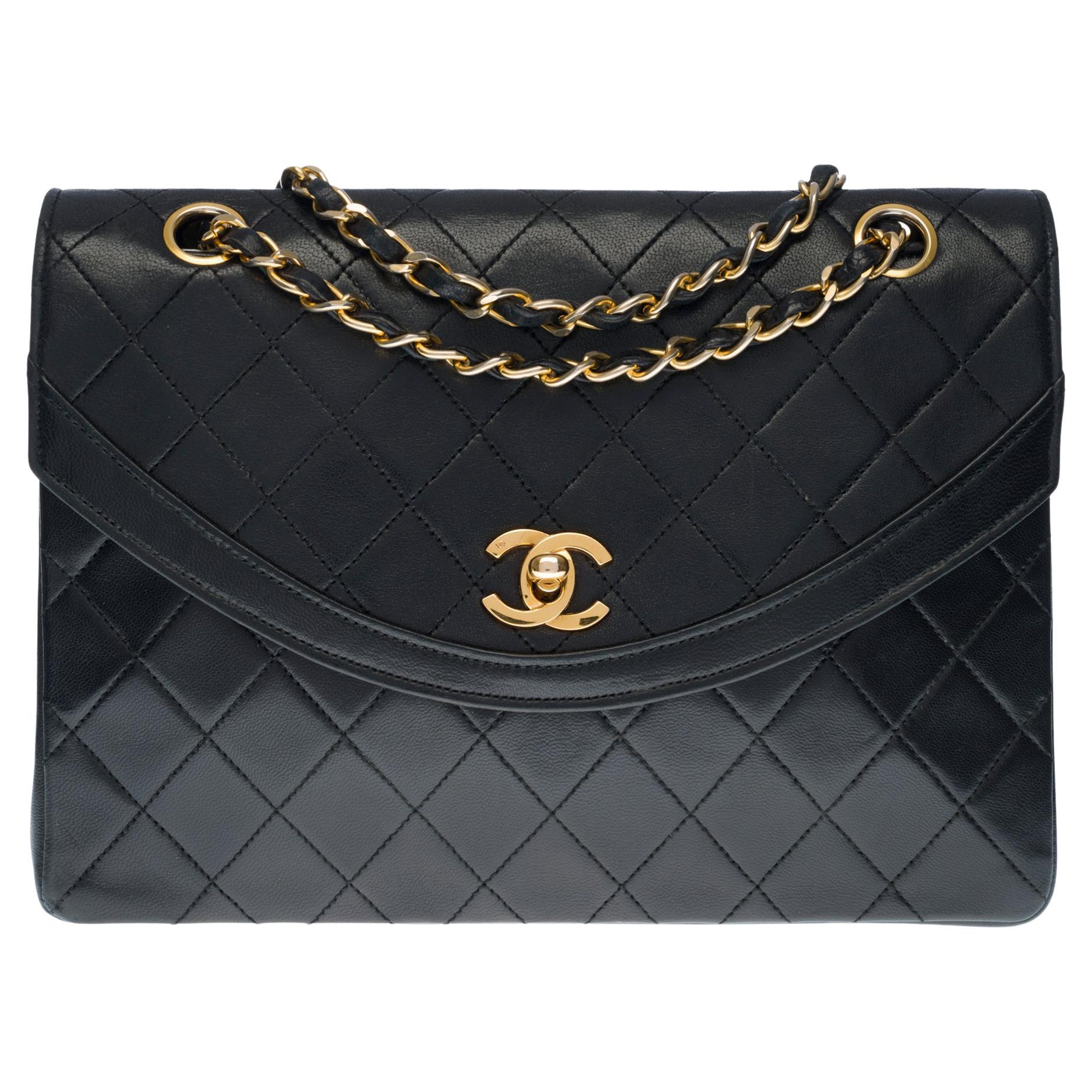 Chanel Classic Flap shoulder bag in black quilted lambskin and gold hardware