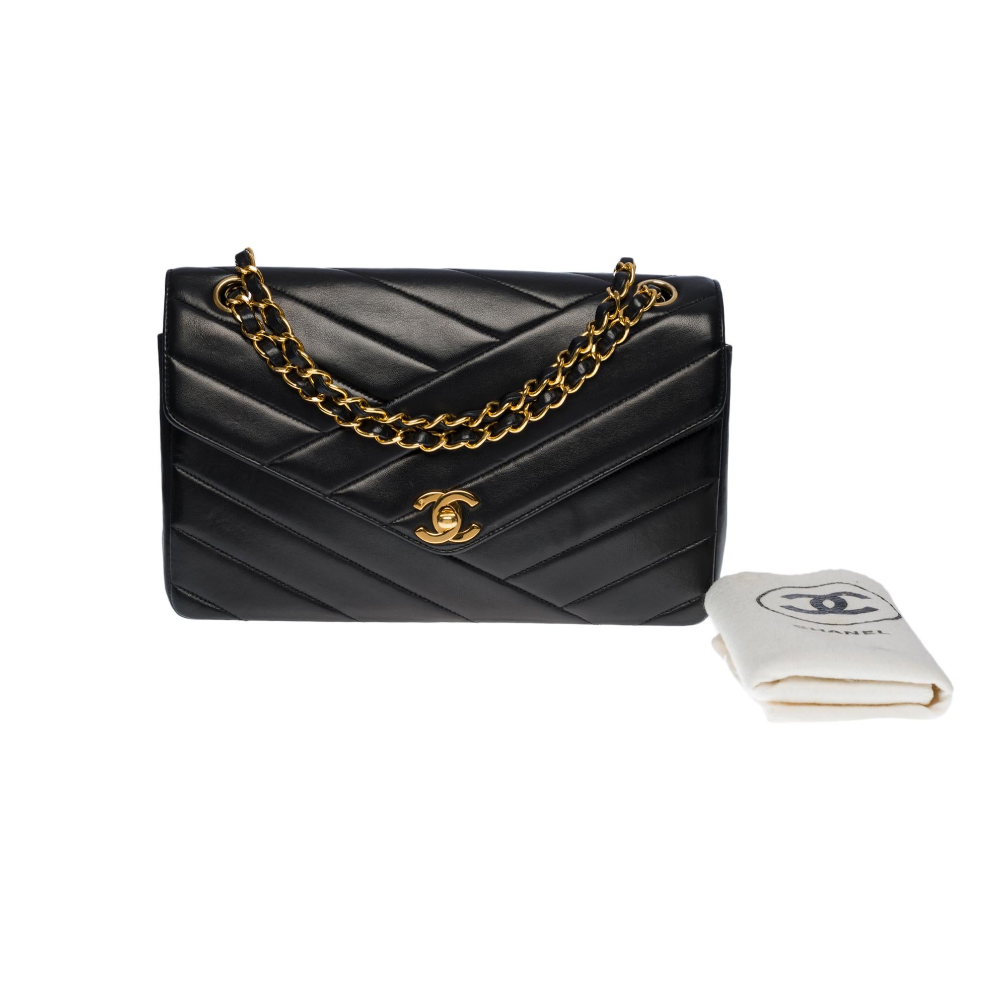 Chanel Classic Flap shoulder bag in black quilted leather with herringbone , GHW 5