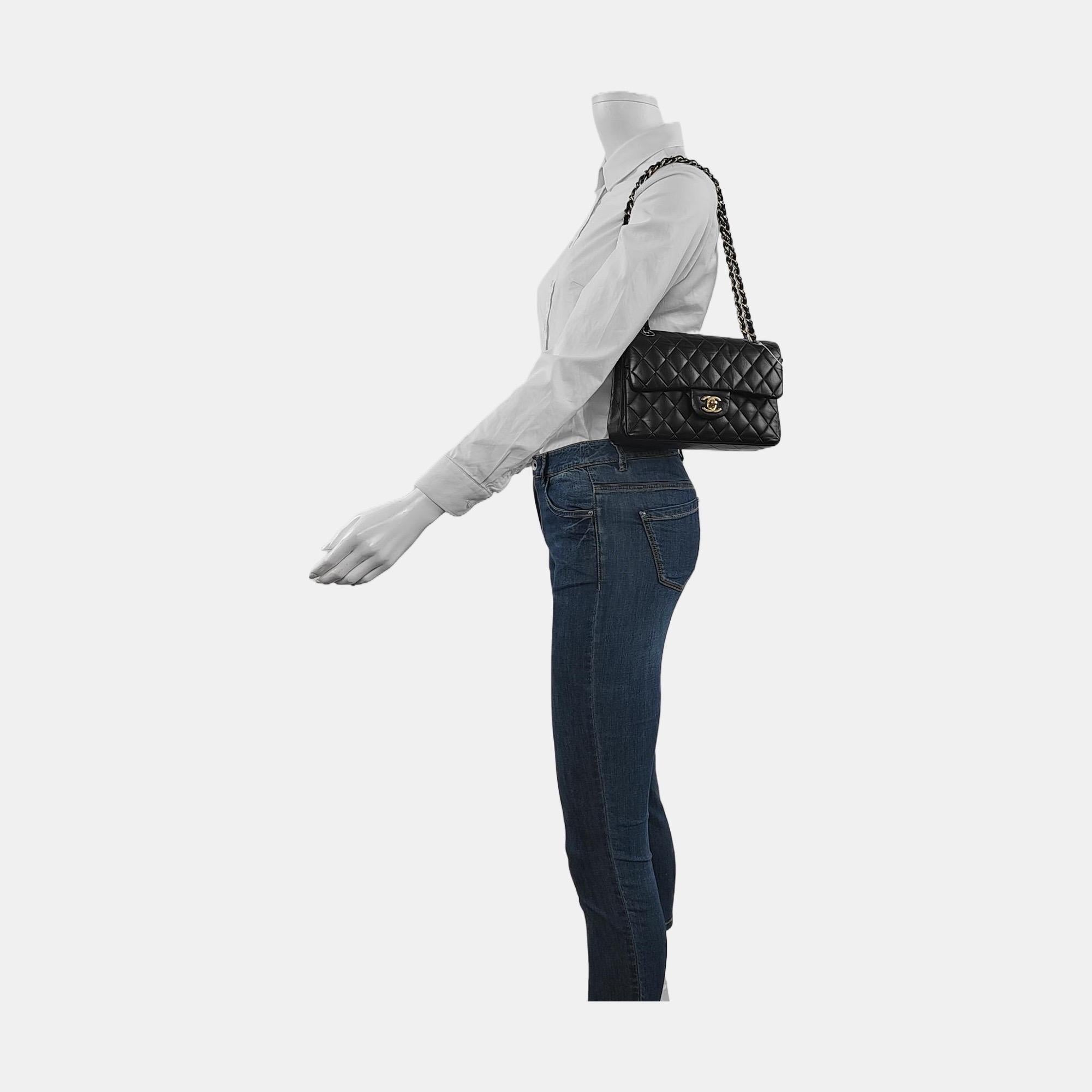 This one-of-a-kind Chanel Classic Flap bag exudes sophistication and timeless elegance. Crafted from luxurious black lambskin leather, it is adorned with gold-tone hardware. 

CONDITION: GOOD CONDITION

This preloved authentic Chanel bag is in very