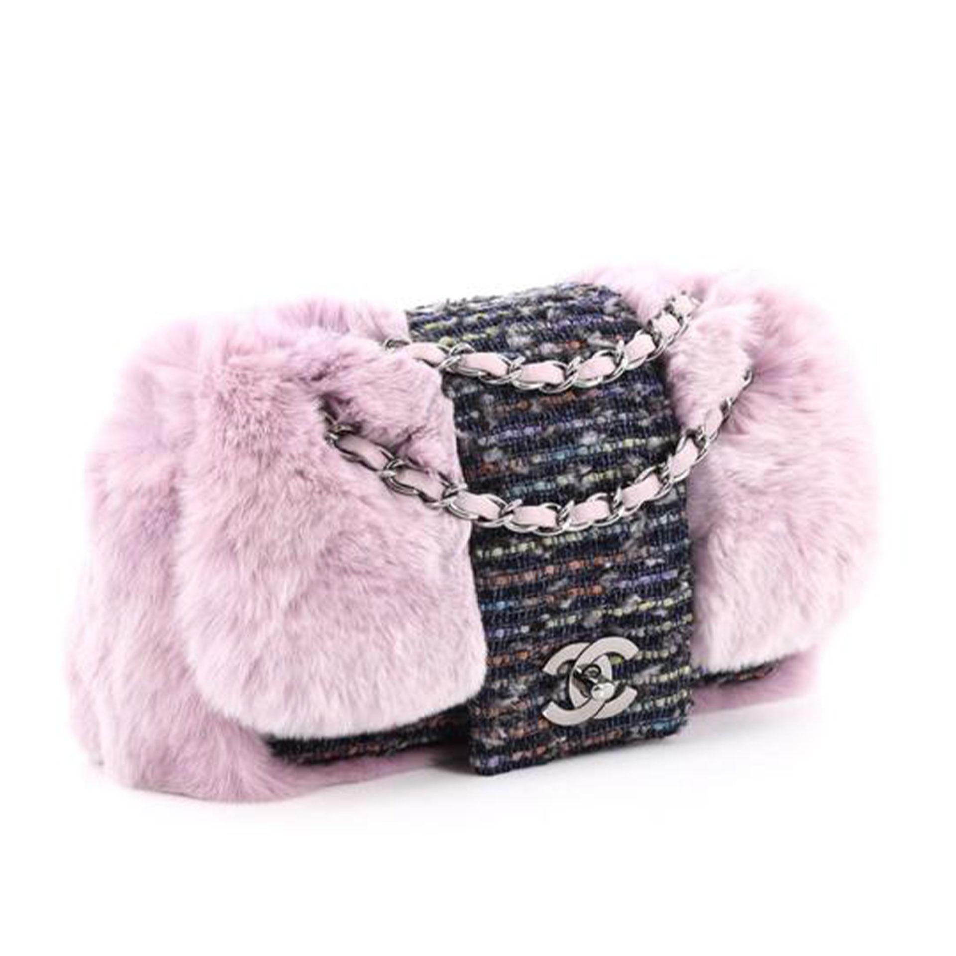 Chanel Classic Flap Vintage 2000s Pink & Grey Tweed and Fur Cross Body Bag

2005 {VINTAGE 16 Years}
Light purple genuine rabbit fur with multicolor black, blue and tweed, 
CC turn lock closure 
Classic interwoven chain
ps and chrome-tone hardware