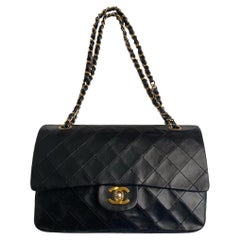 CHANEL, Classic Flap Vintage in black leather