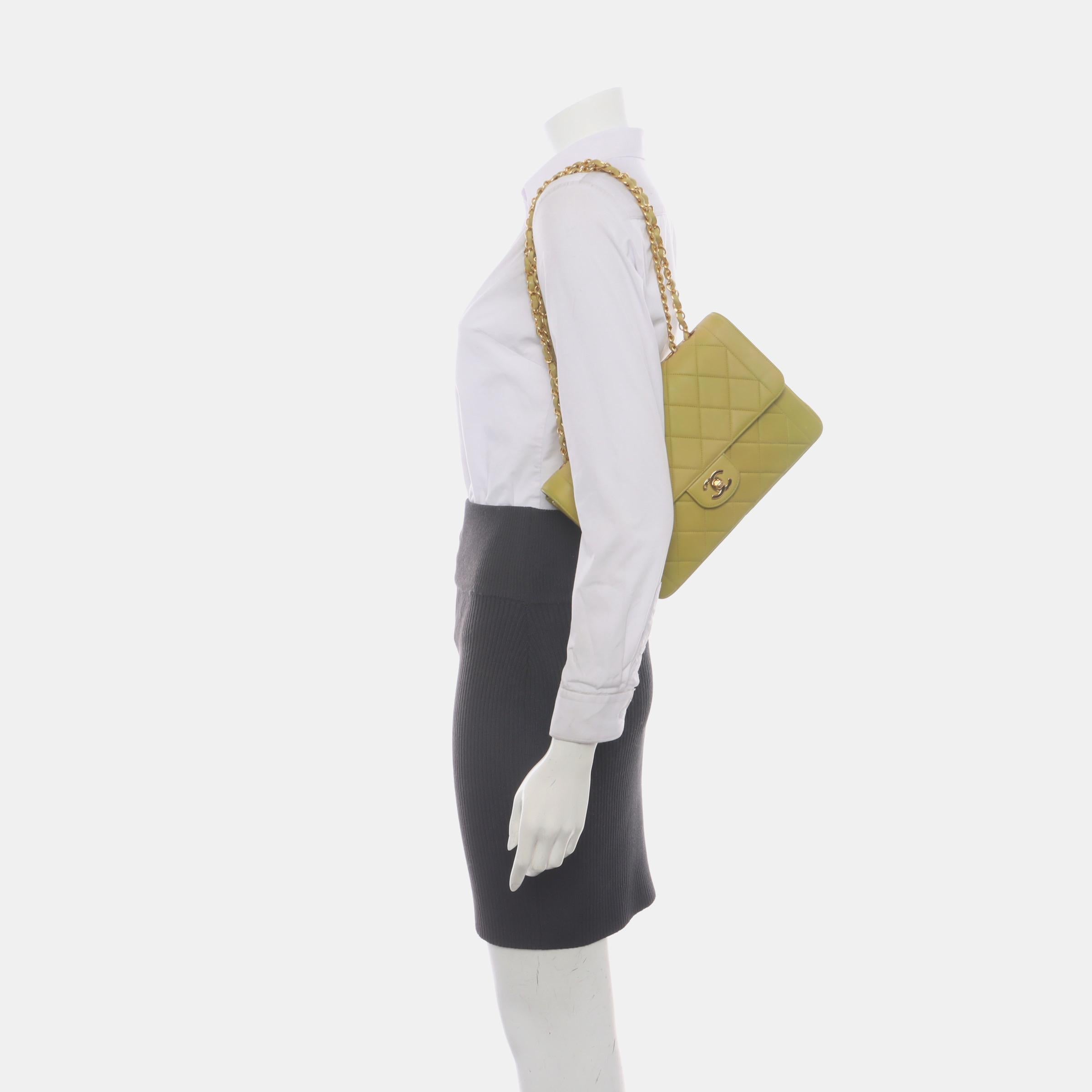 This one-of-a-kind Chanel Classic Flap Vintage bag exudes sophistication and timeless elegance. Crafted from luxurious lambskin leather, it is adorned with 24k gold hardware. 

CONDITION: VERY GOOD CONDITION

This preloved authentic Chanel bag is in