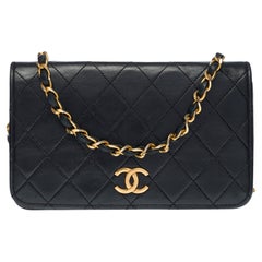 Chanel Classic Full Flap Mini shoulder bag in black quilted leather and GHW