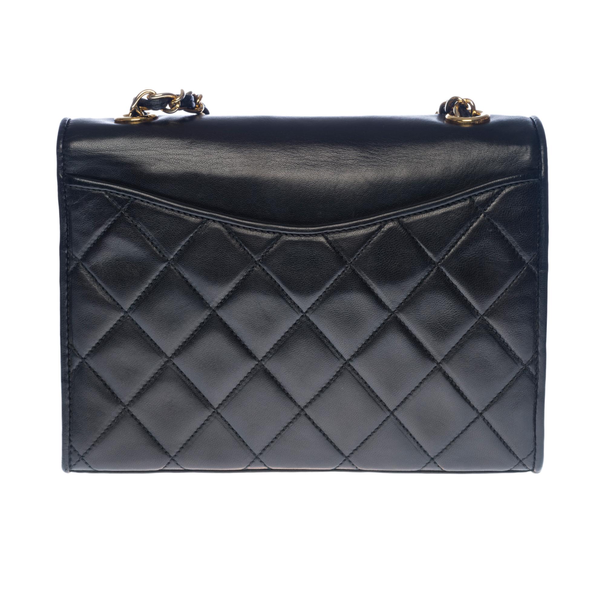 Charming Chanel Full flap pockets in black quilted lambskin leather, gold-tone metal hardware, a gold-tone metal chain handle interlaced with black leather for a shoulder and shoulder strap

Satin front and back patch pockets
Flap closure, magnetic