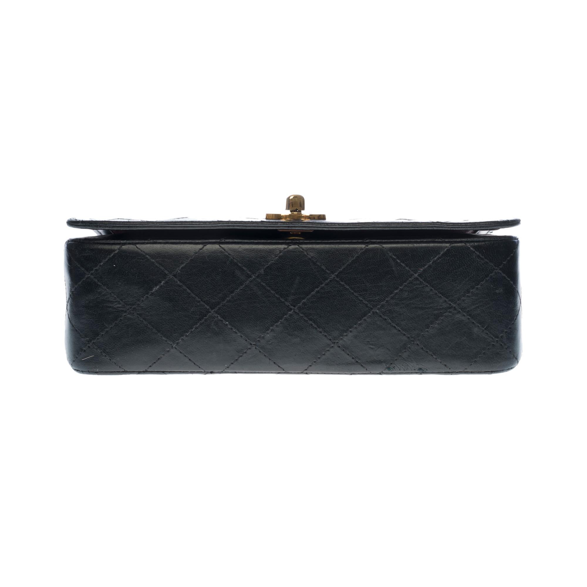 Women's Chanel Classic Full Flap shoulder bag in black quilted leather and GHW