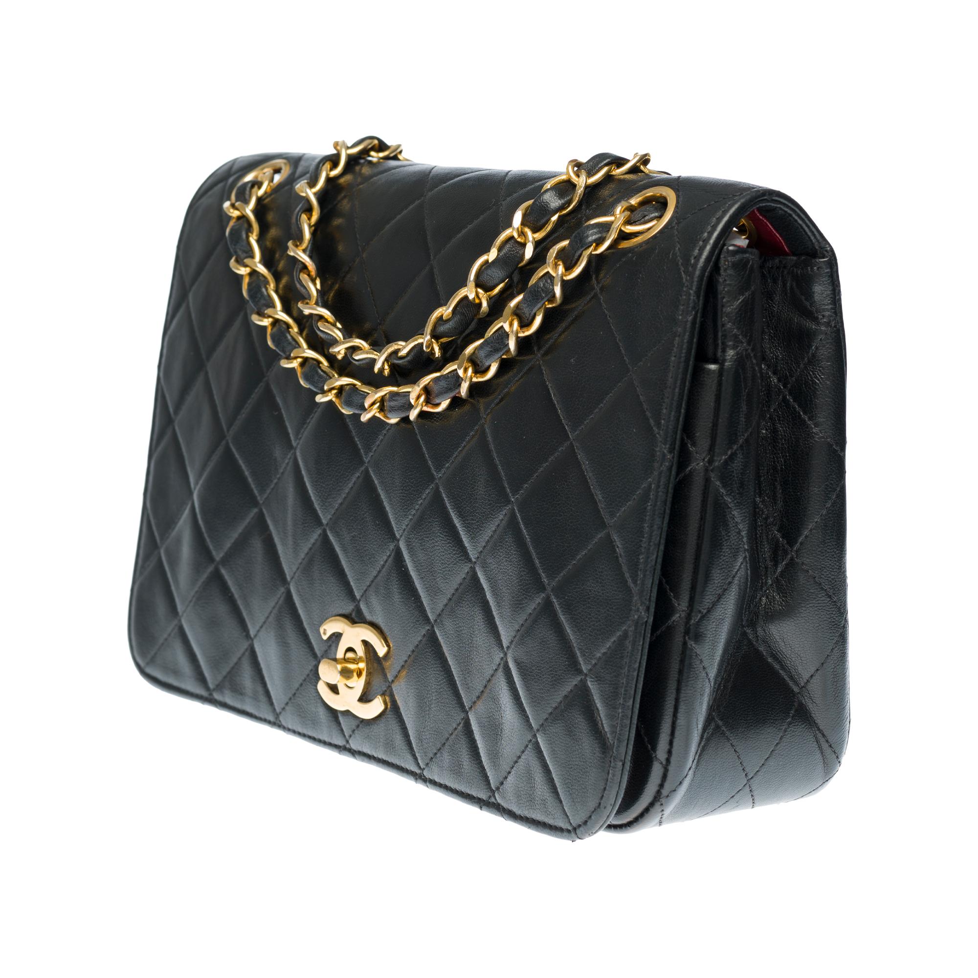 Black Chanel Classic Full Flap shoulder bag in black quilted leather and gold hardware