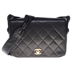 Chanel Classic Full Flap shoulder bag in black quilted leather and gold hardware