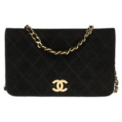 Chanel Classic Full Flap shoulder bag in black quilted Suede and gold hardware