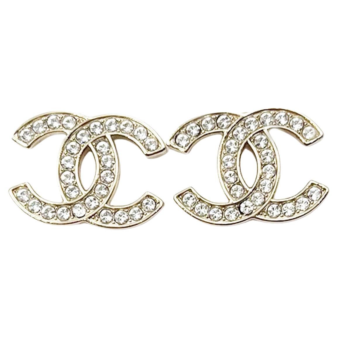 CHANEL CC Stud Earrings in Pale Gilded Metal at 1stDibs  silver chanel  stud earrings, chanel diamond stud earrings, chanel double c diamond  earrings