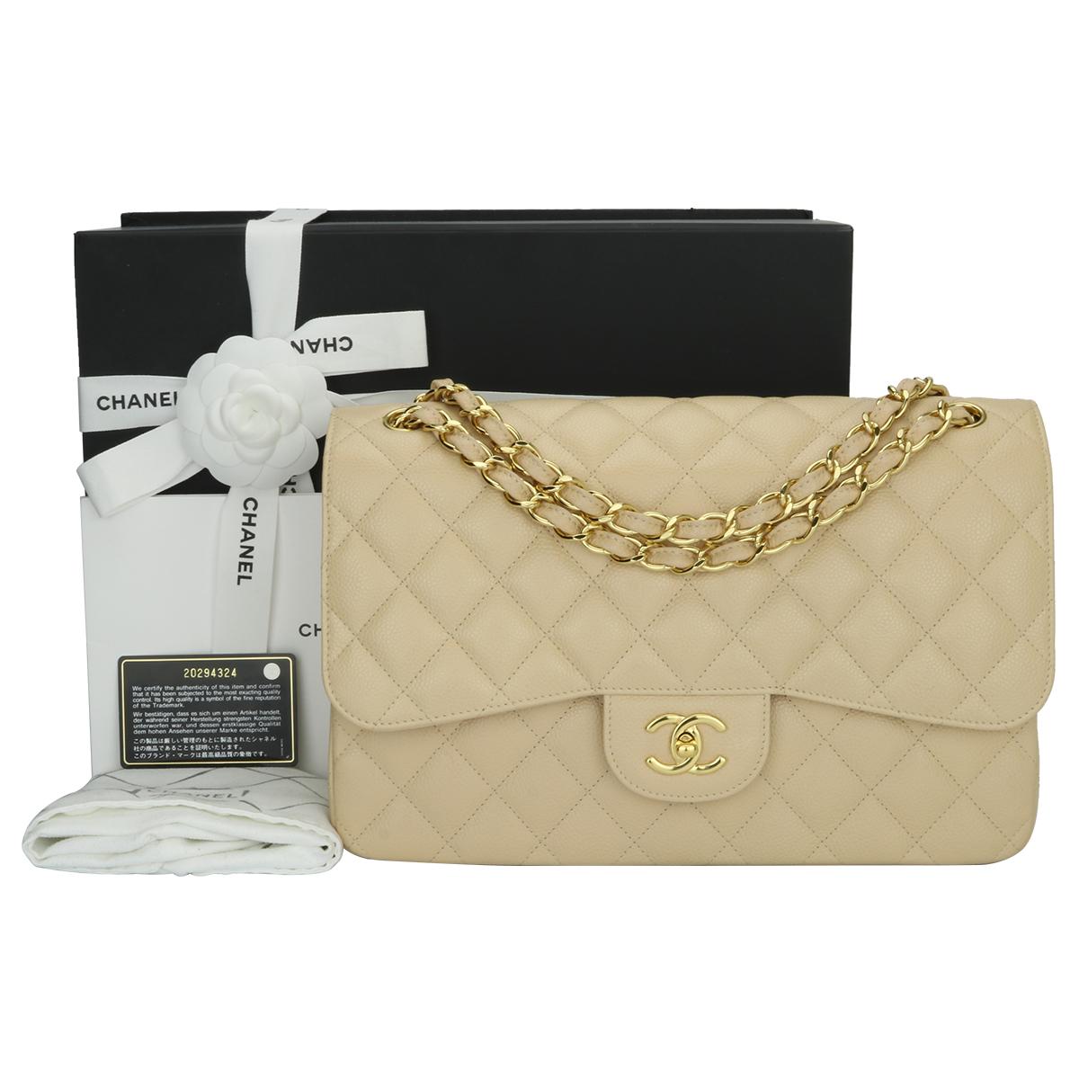 Authentic CHANEL Classic Jumbo Double Flap Beige Clair Caviar with Gold Hardware 2015.

This stunning bag is in a pristine-brand new condition, the bag still holds its original shape, and the hardware is still very shiny. Leather smells fresh as if