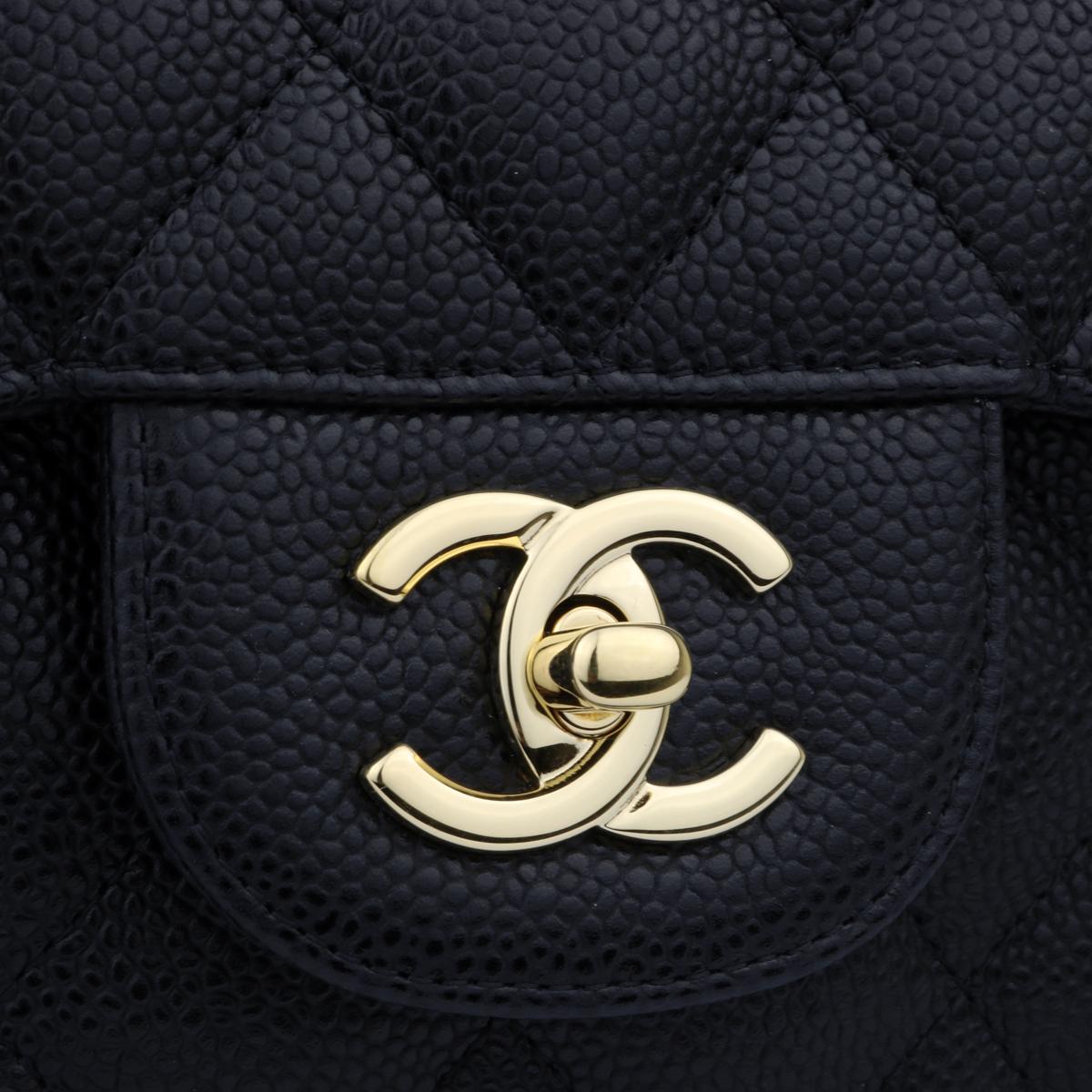 Authentic CHANEL Classic Jumbo Double Flap Black Caviar with Gold Hardware 2014.

This stunning bag is in mint condition, the bag still holds its original shape, and the hardware is still very shiny. Leather smells fresh as if new.

Exterior