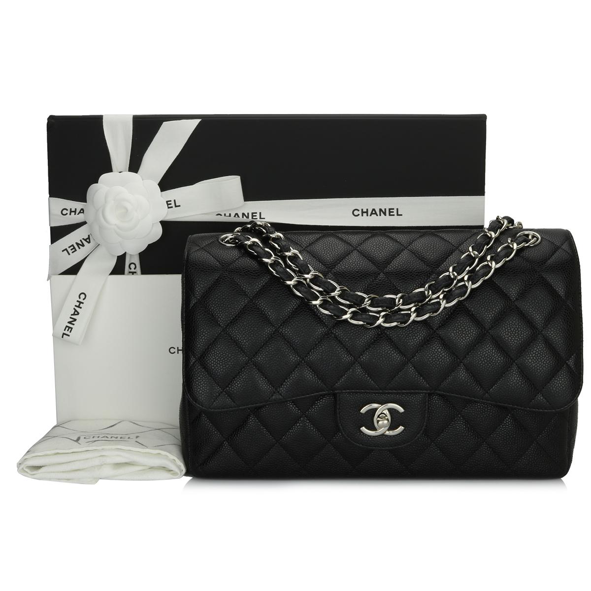 Authentic CHANEL Classic Jumbo Double Flap Bag Black Caviar with Silver Hardware 2013.

This stunning bag is in excellent condition, the bag still holds its original shape, and the hardware is still very shiny.

Exterior Condition: Excellent