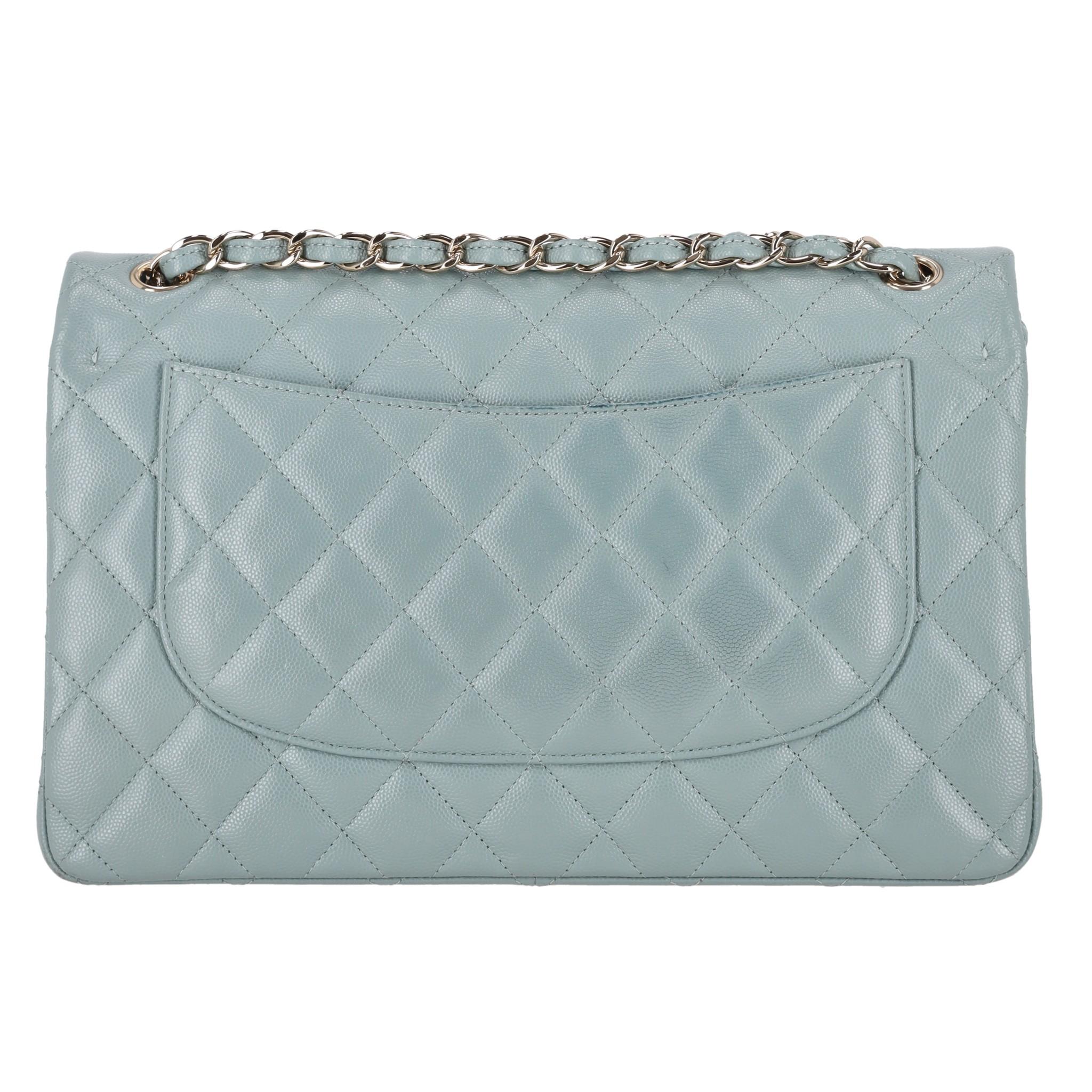Chanel Classic Jumbo Double Flap Caviar Leather Handbag

Timeless light livid bag crafted from iconic diamond quilted caviar leather.

Featuring double front flap and signature 'CC' logo turn-lock closure.

Detailed with silver hardware, leather and
