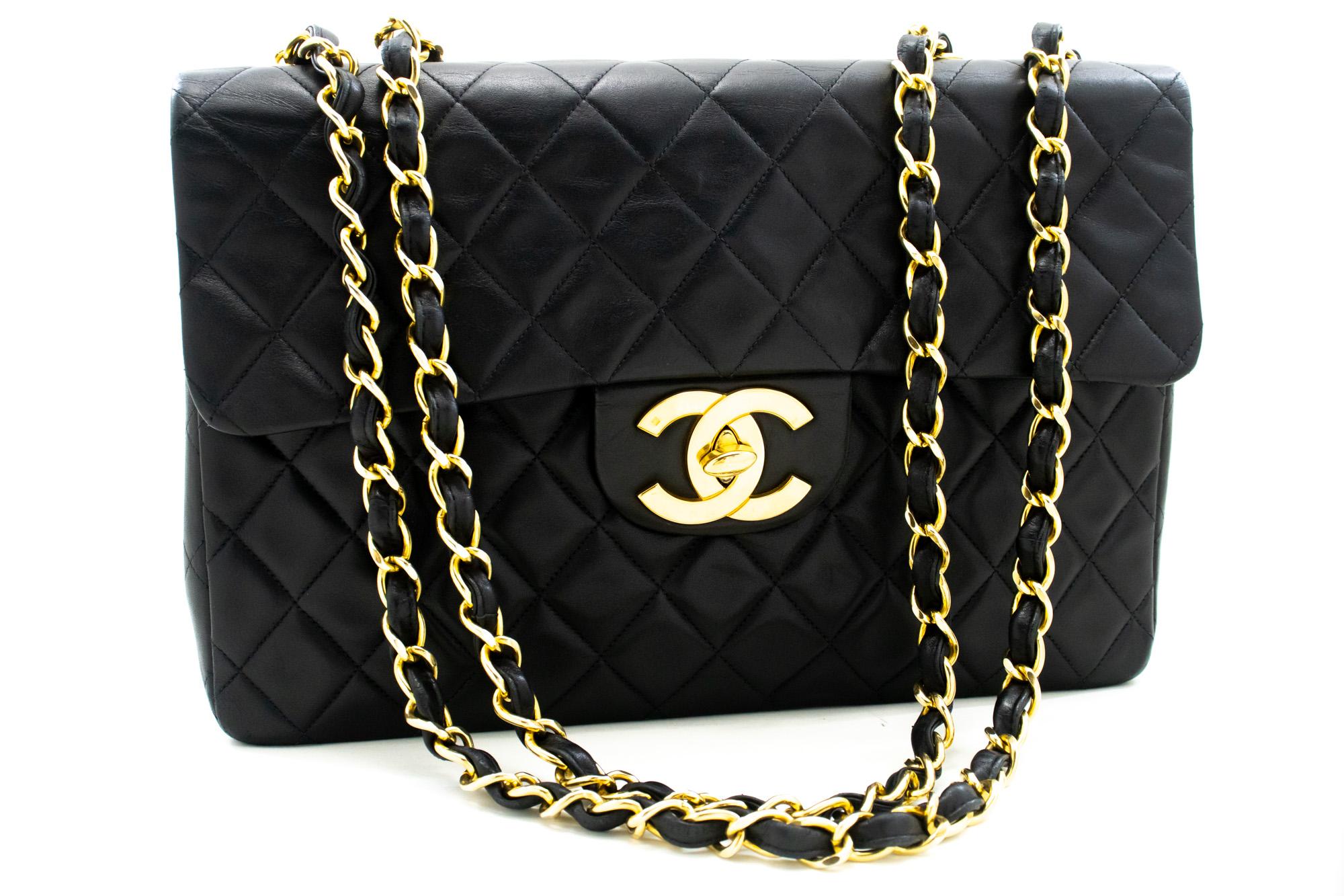 An authentic CHANEL Classic Large 13