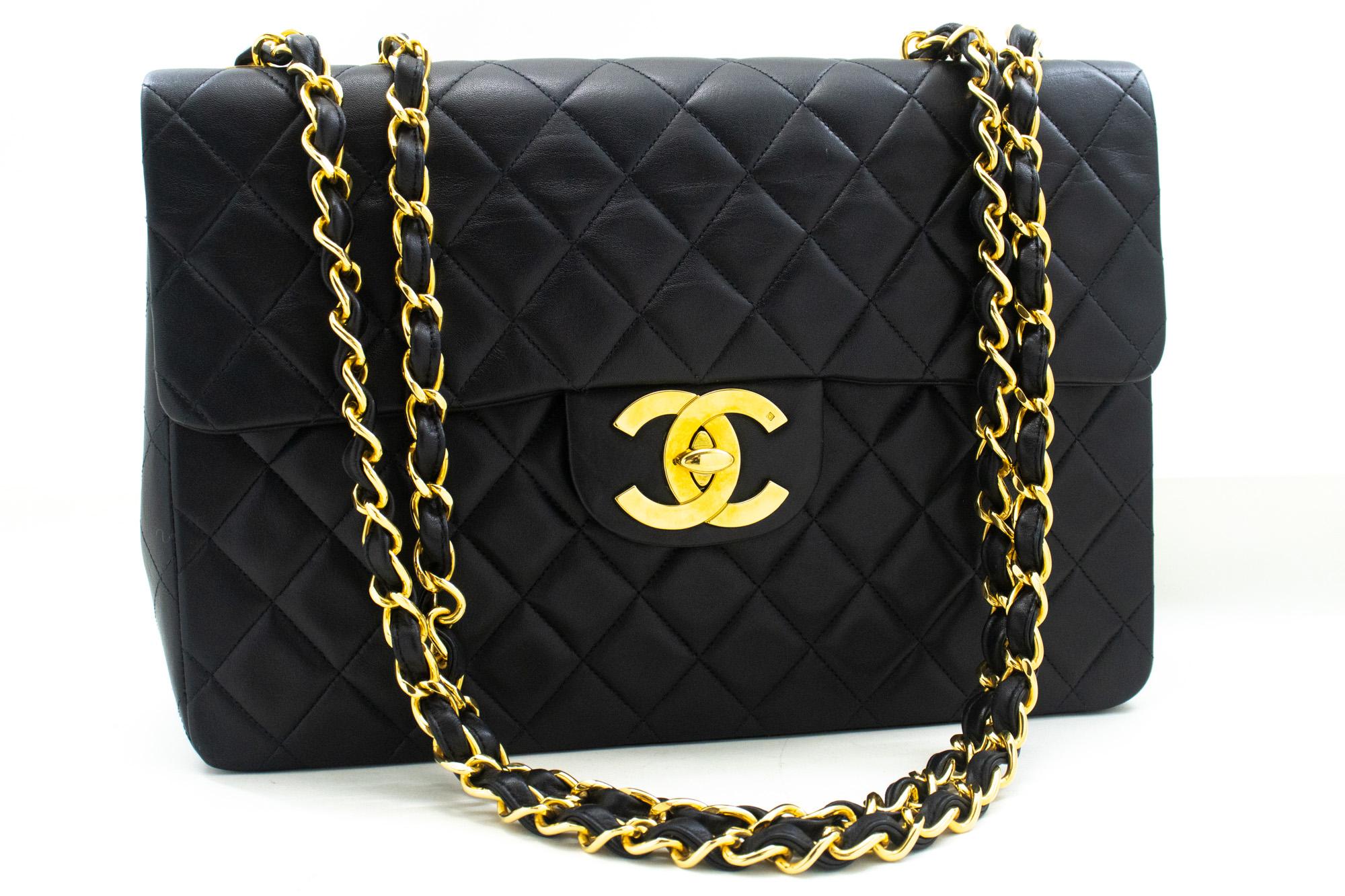 An authentic CHANEL Classic Large 13