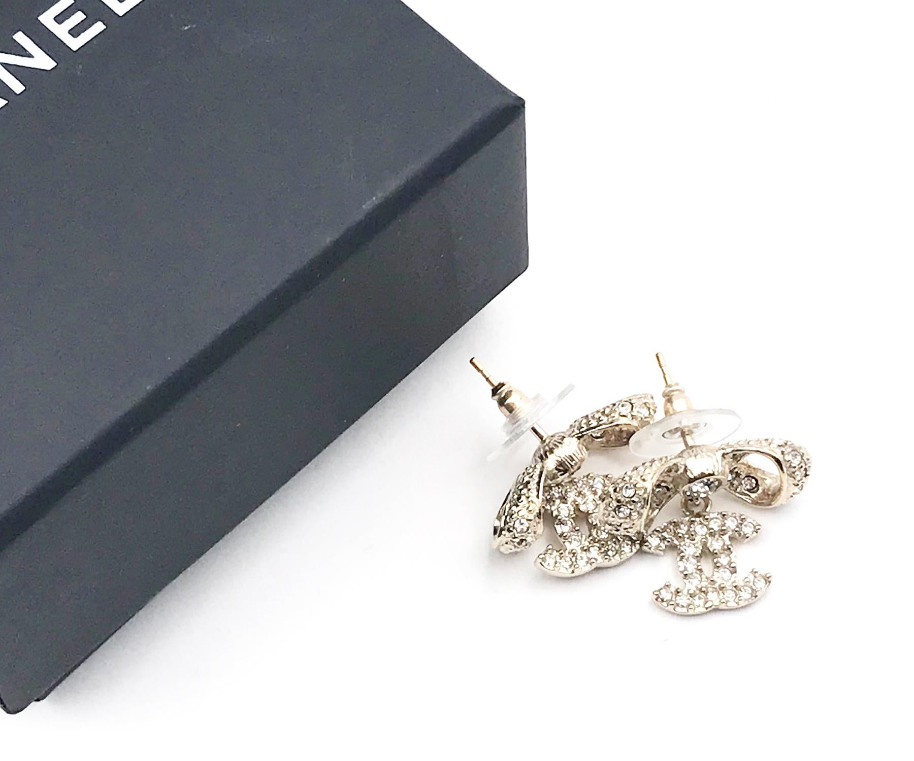 Artisan Chanel Classic Light Gold Ribbon Bow CC Crystal Piercing Earrings For Sale