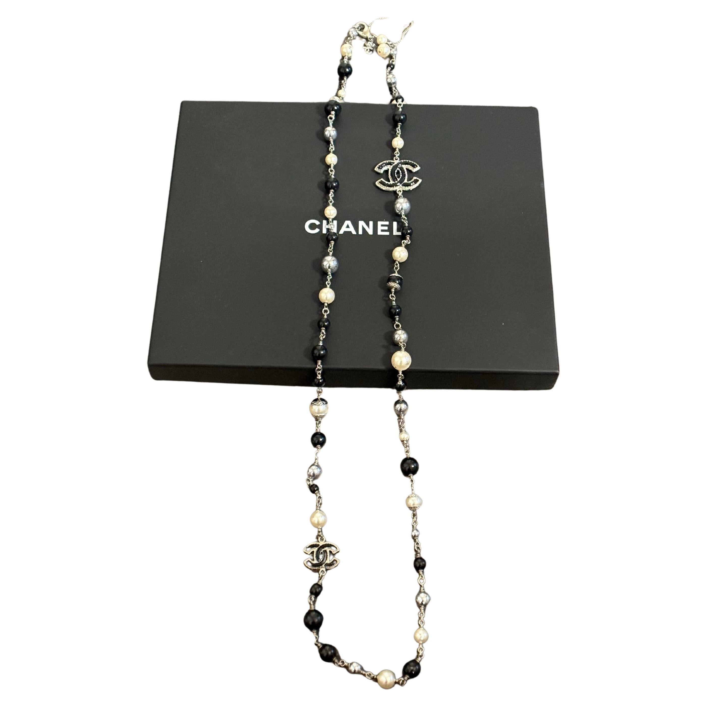 Chanel Classic Long Elegant Black and White Pearl Glass CC Necklace