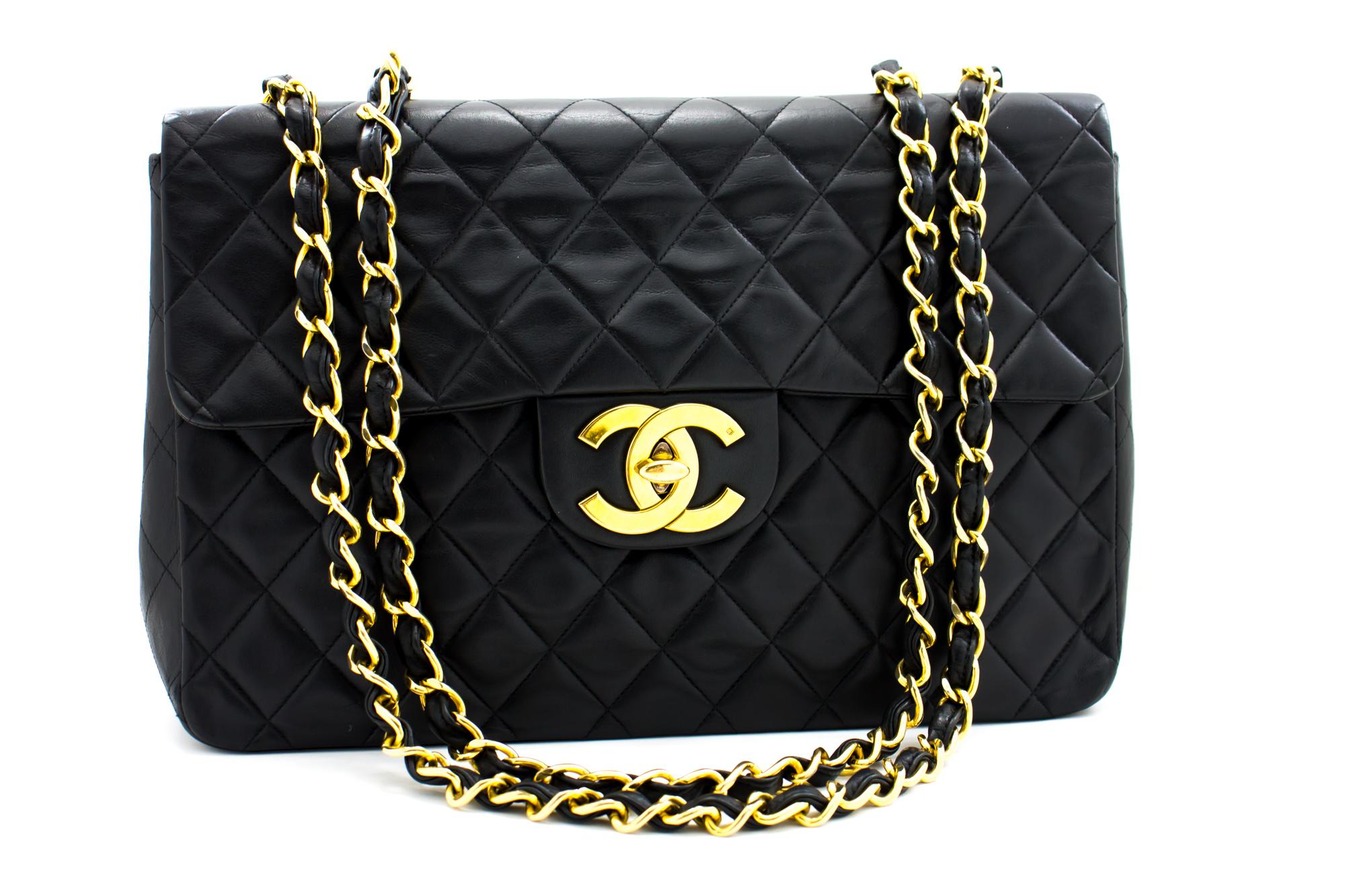 An authentic CHANEL Classic Maxi 13